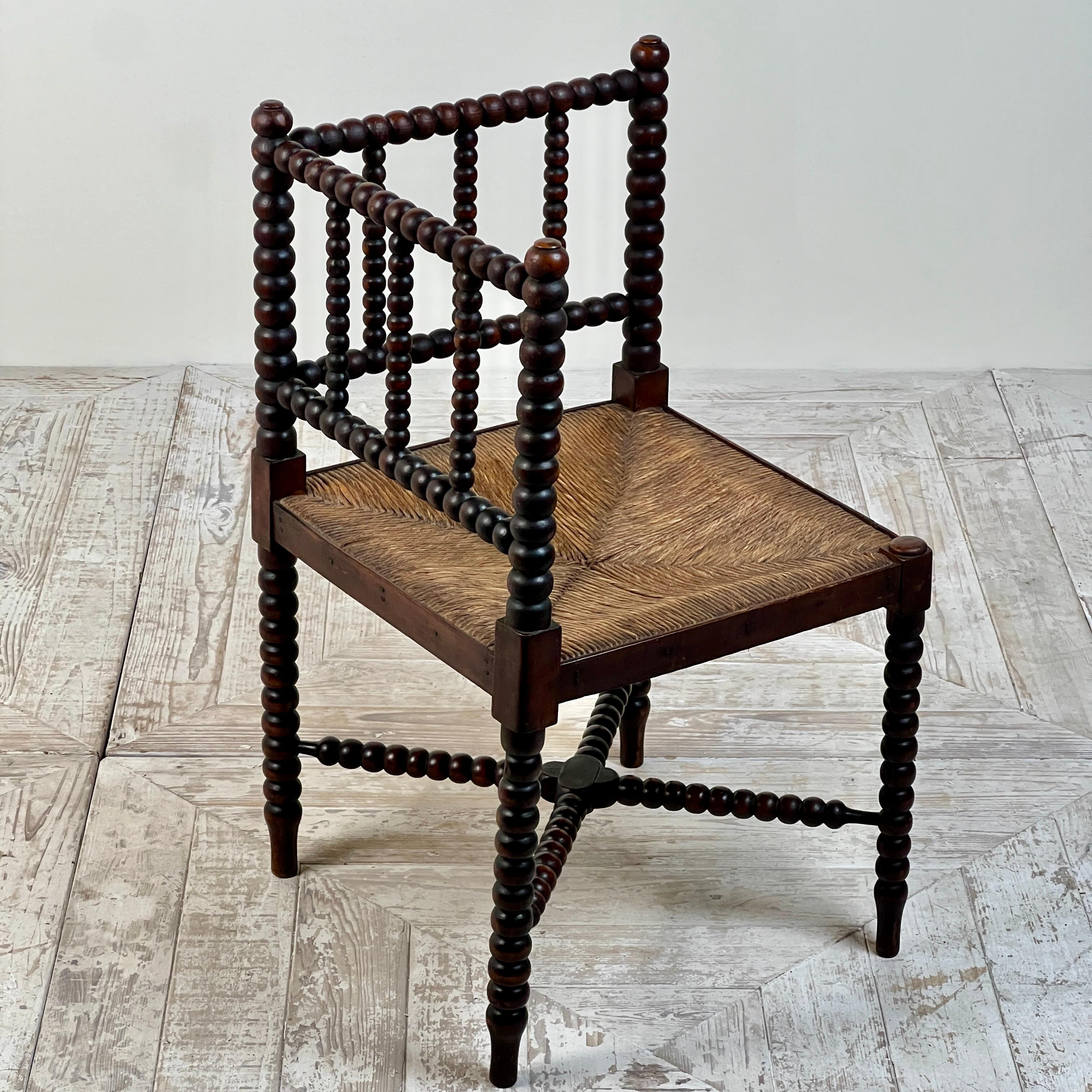 Hand-Crafted A 19th Century Corner Bobbin Chair With Rush Seat