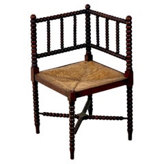 A 19th Century Corner Bobbin Chair With Rush Seat