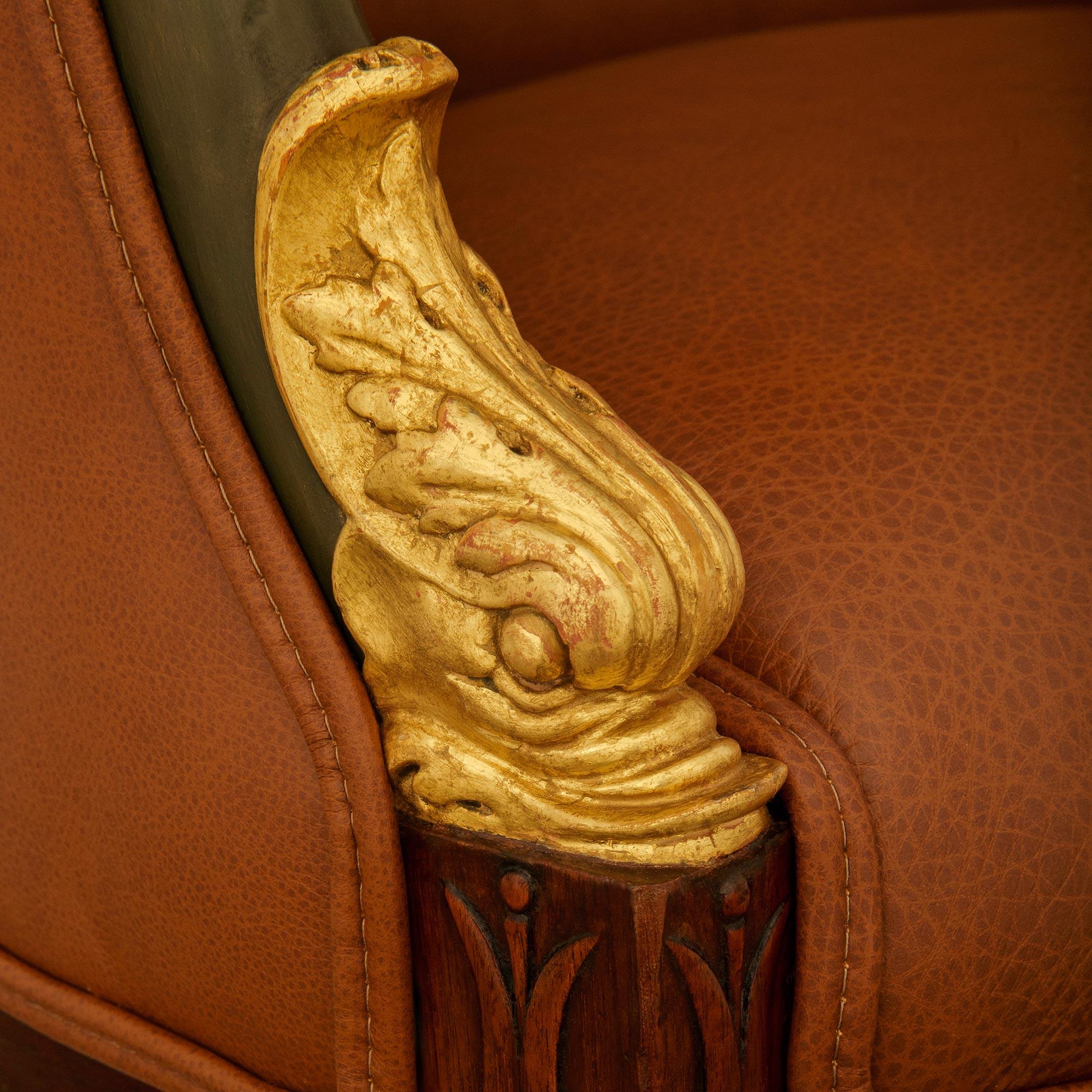 A 19th century Empire st. Mahogany, Giltwood, Ormolu and Leather armchair For Sale 3