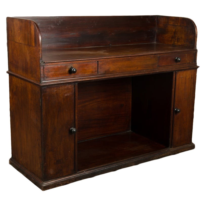 A 19th Century English Mahogany Kneehole Desk.