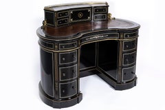 A 19th Century English Regency Kidney Form Black Ebony Desk