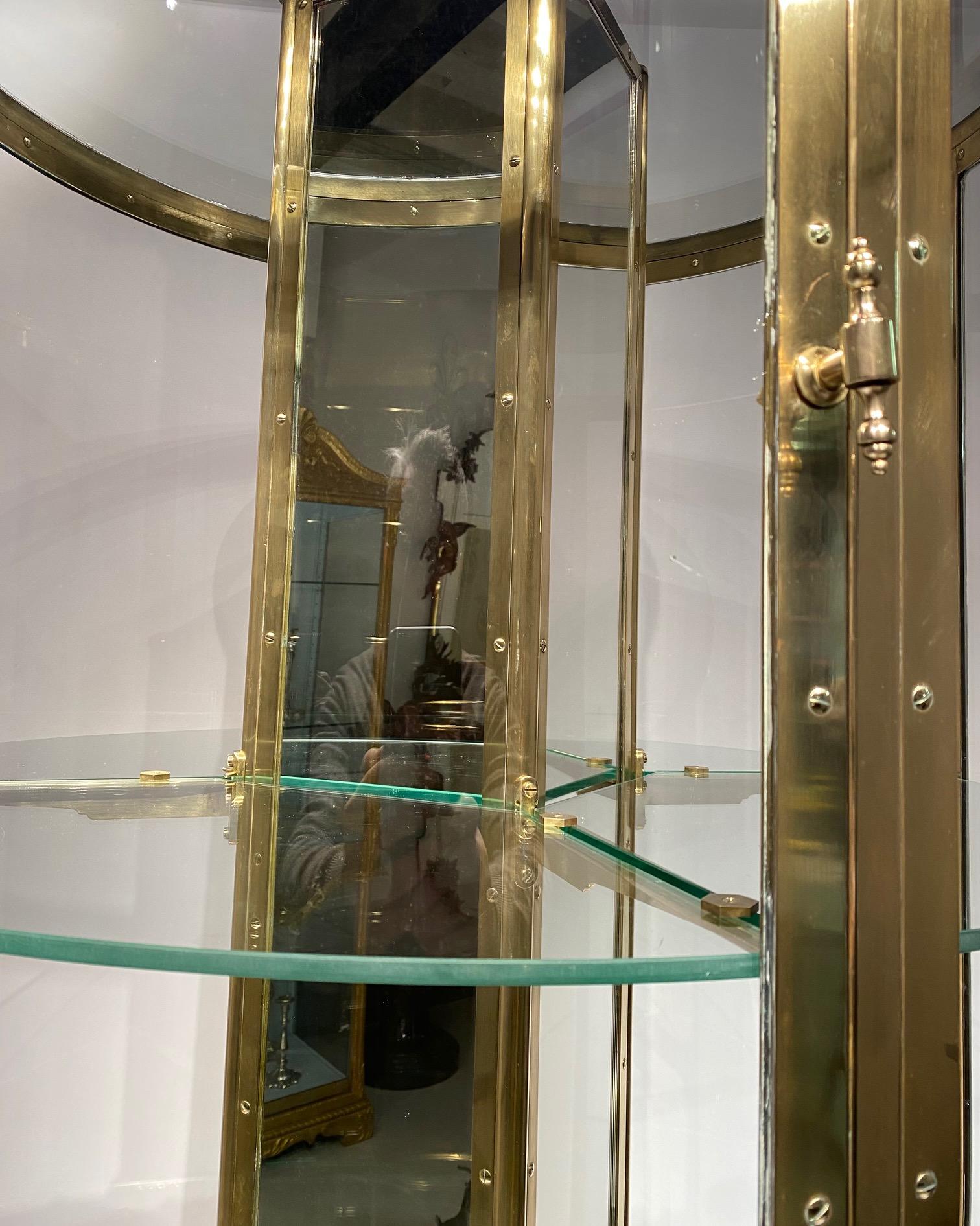 An early 20th century English round freestanding  display cabinet. 3