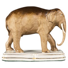 A 19th Century English Staffordshire Pottery Model of an Elephant