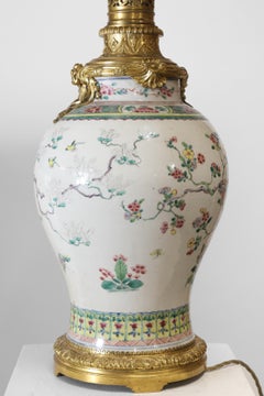 A 19th Century famille rose porcelain vase fitted as a lamp