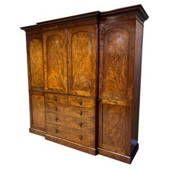 A 19th century flamed mahogany country house breakfront wardrobe