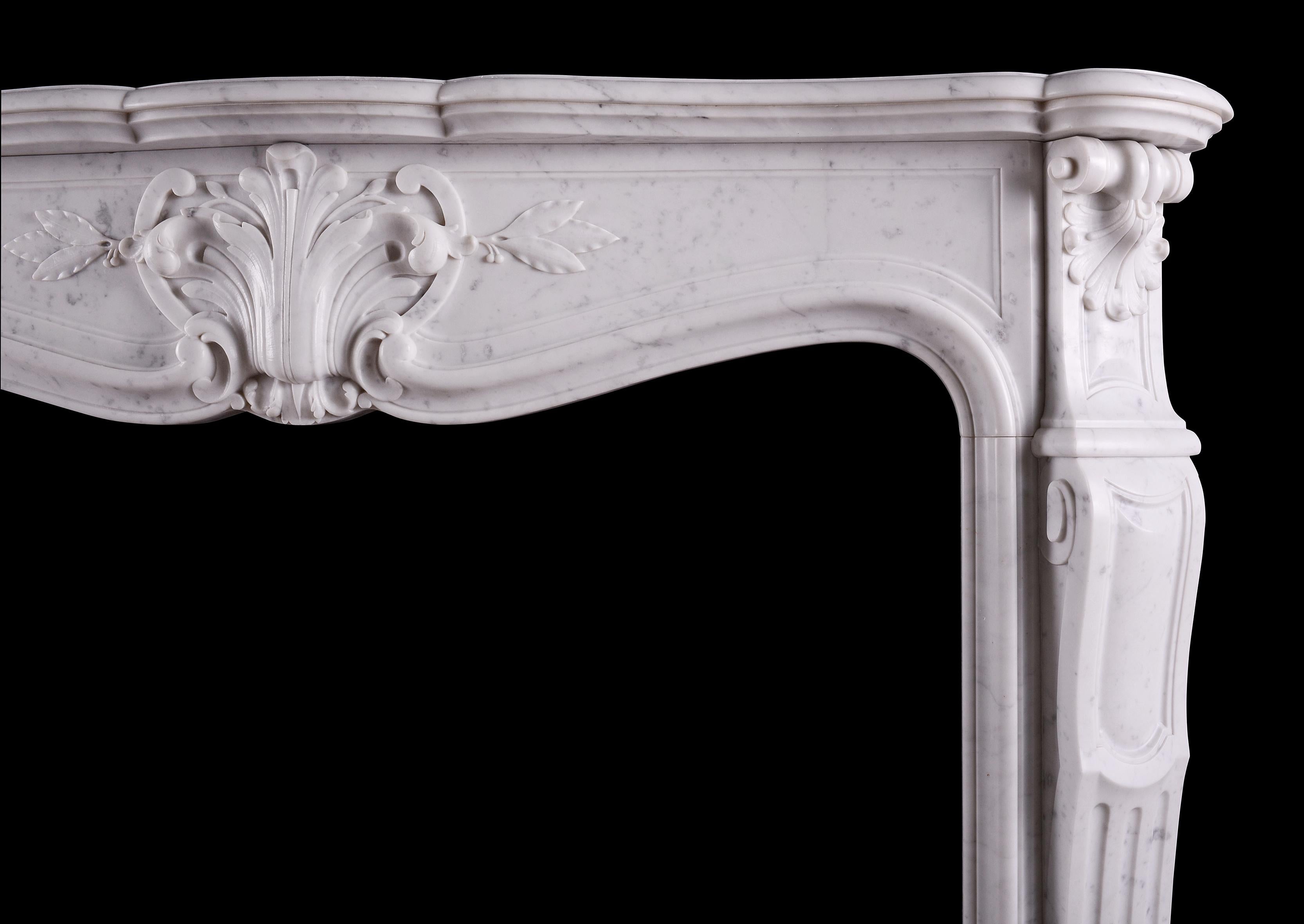 A 19th Century French Carrara Marble Fireplace in the Louis XV Style In Good Condition For Sale In London, GB