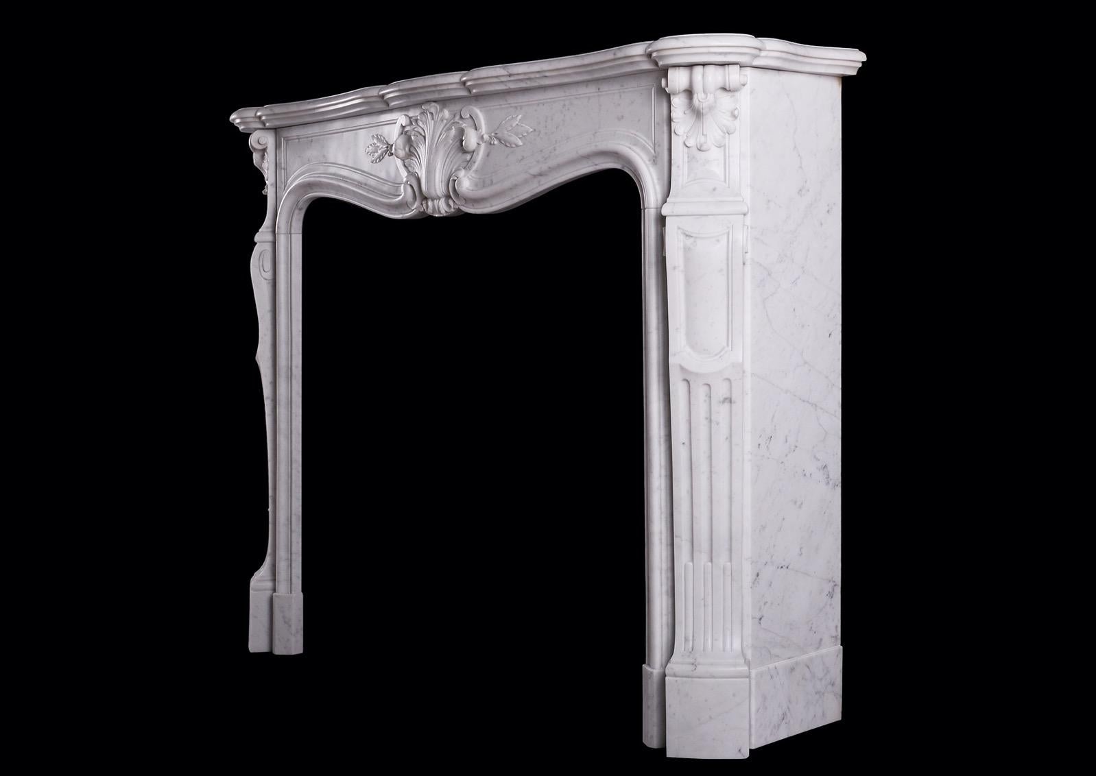 A 19th Century French Carrara Marble Fireplace in the Louis XV Style For Sale 2