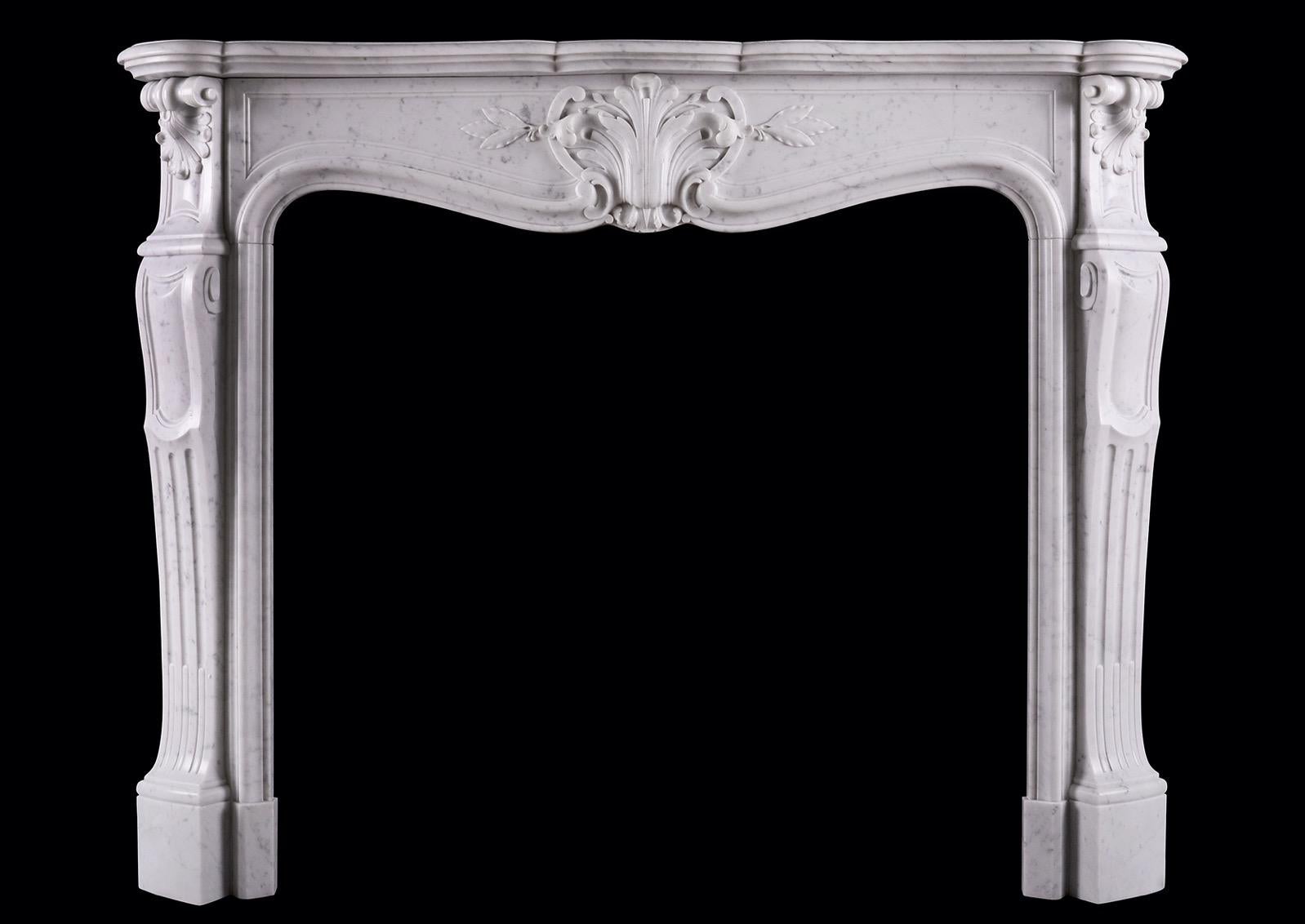 A 19th Century French Carrara Marble Fireplace in the Louis XV Style For Sale 3