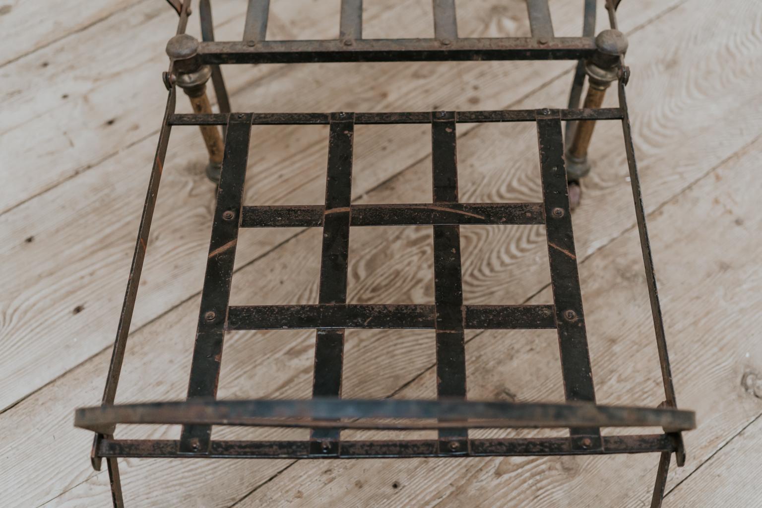 Genuine and smart this 19th century iron and brass folding chair, with original coasters.