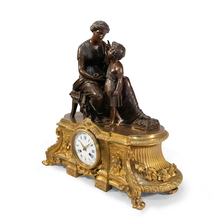 Louis XVI A 19th Century French Gilt & Patinated Bronze Figural Mantel Clock by Raingo For Sale
