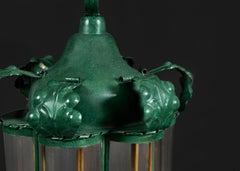 A 19th Century French Green Tole Lantern with Curved Glass