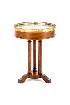 A 19th Century French Gueridon Table with a Marble top and Brass Gallery