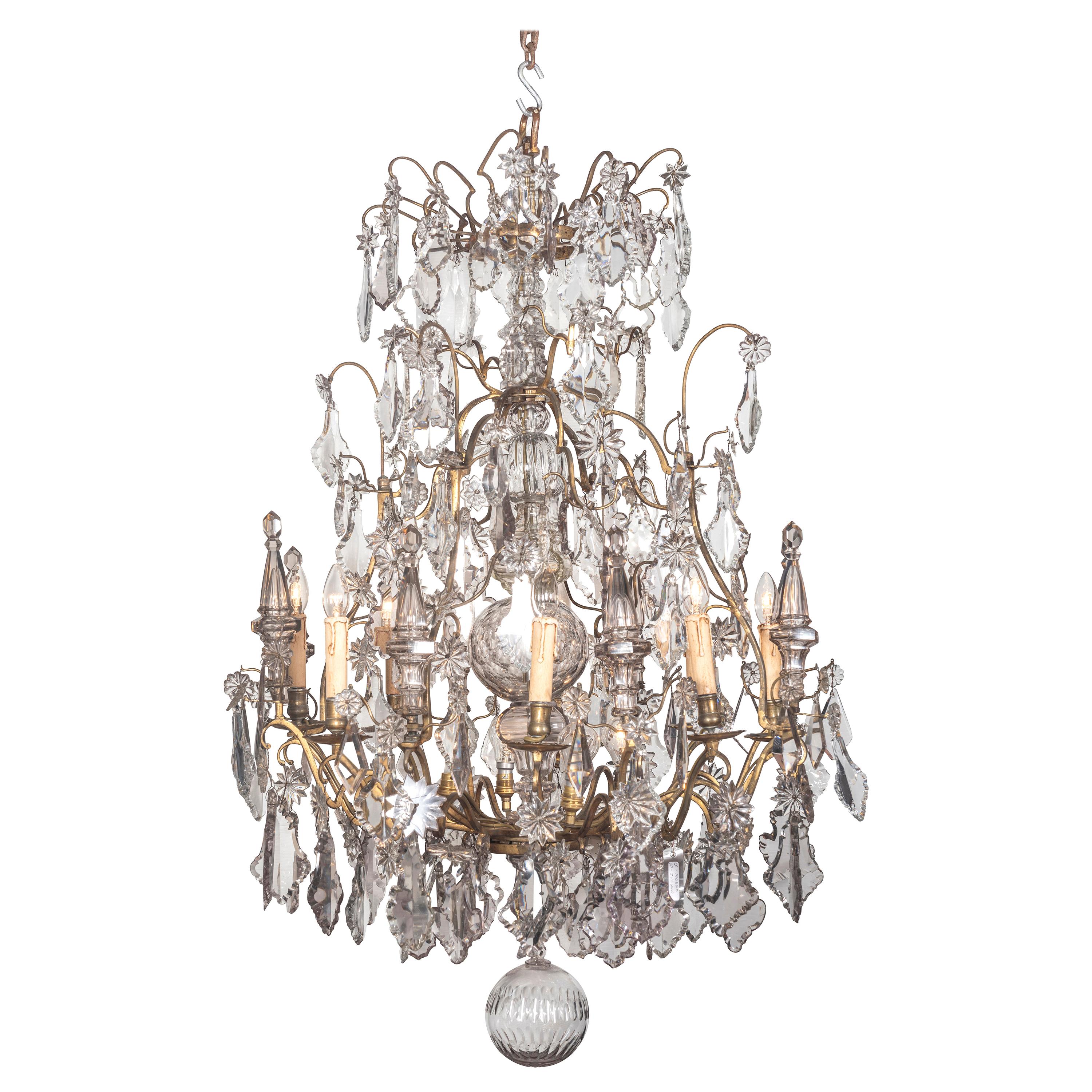 A 19th Century French Louis XV Style Crystal and Gilt Twenty-Light Chandelier For Sale