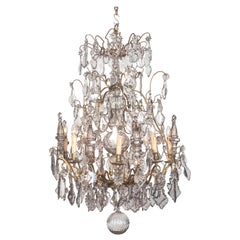 A 19th Century French Louis XV Style Crystal and Gilt Twenty-Light Chandelier