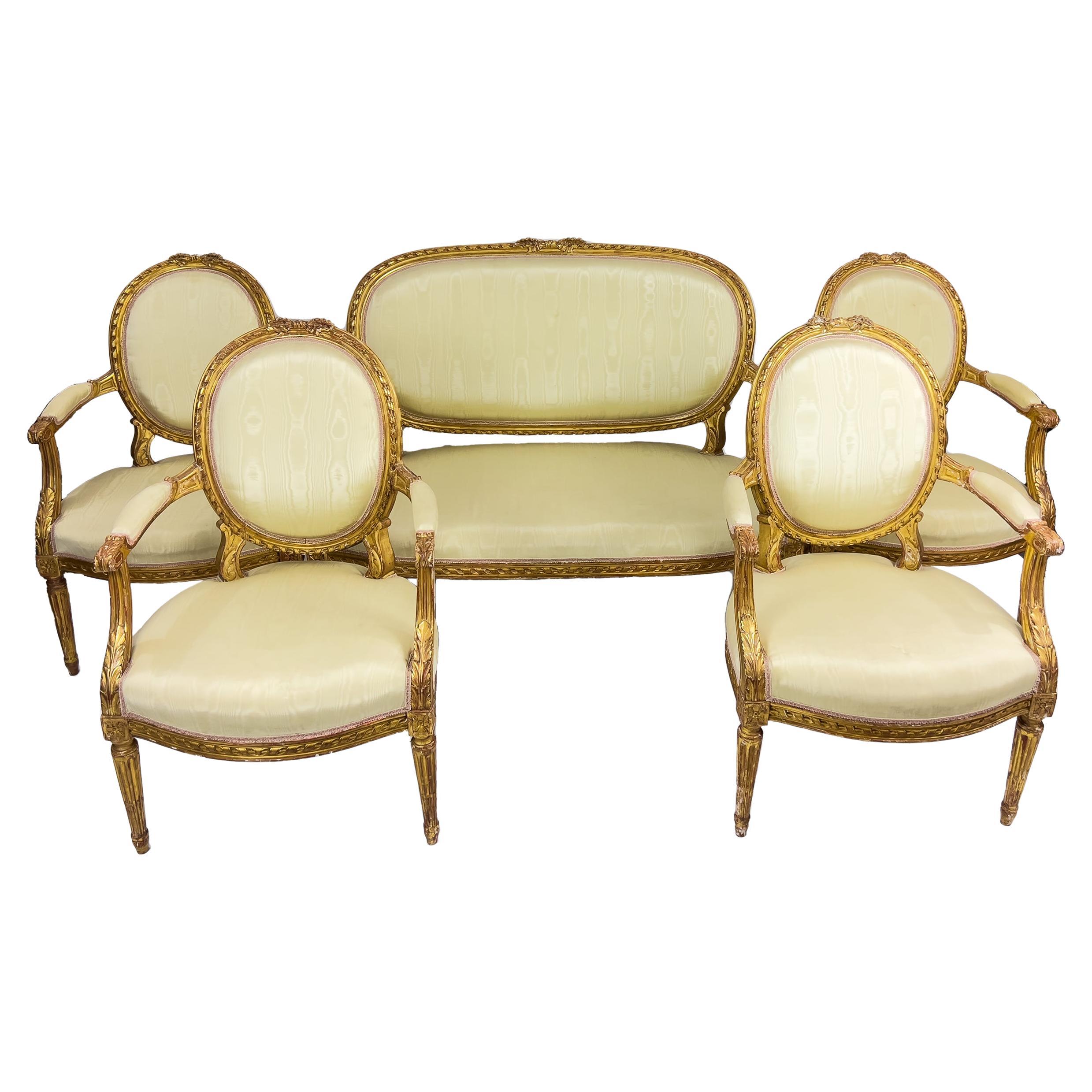 Fünfteilige Salon-Suite aus vergoldetem Holz im französischen Louis-XVI.-Stil des 19. Jahrhunderts im Angebot