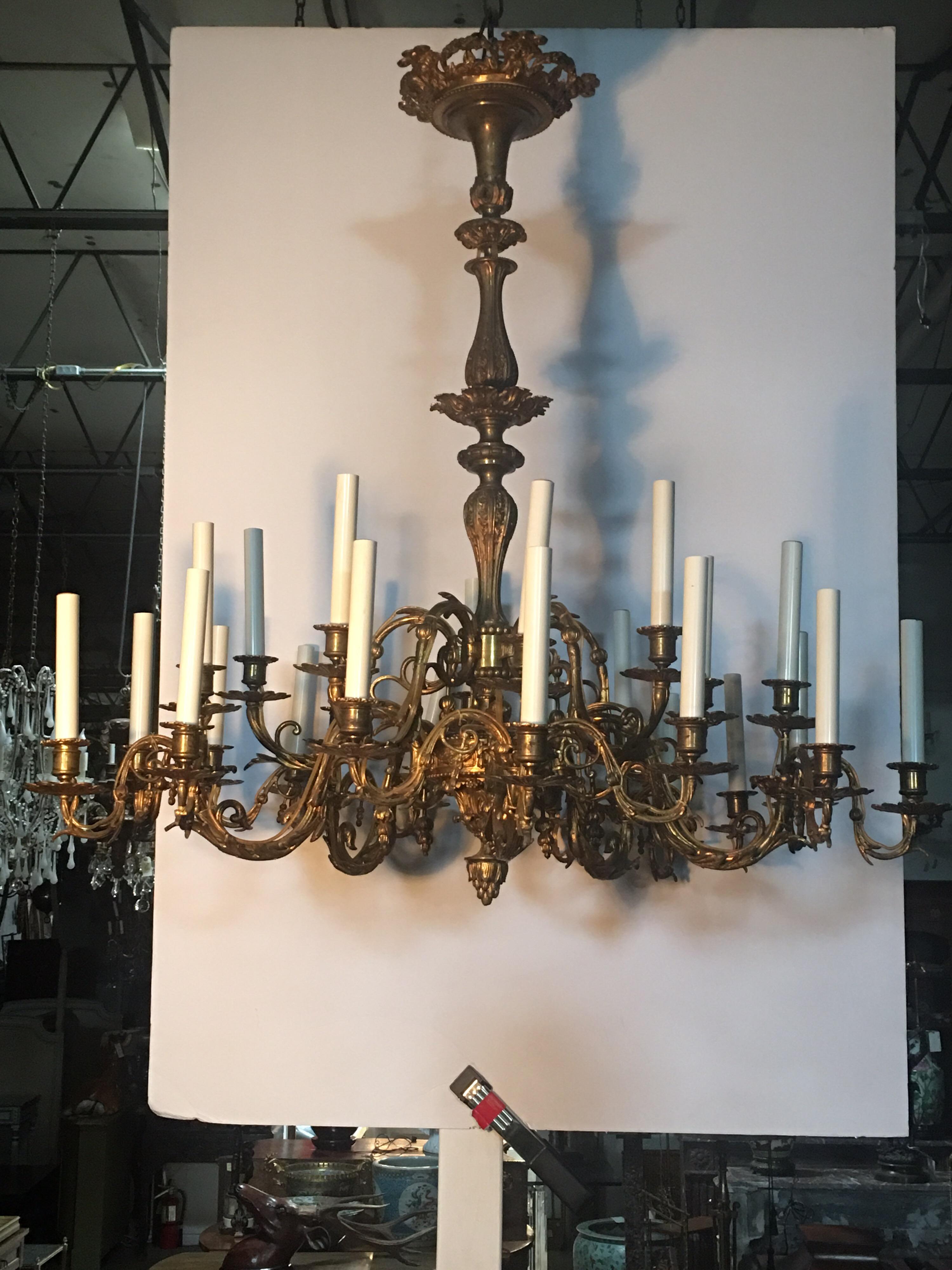 A 19th century French Louis XVI style 25 light bronze chandelier.