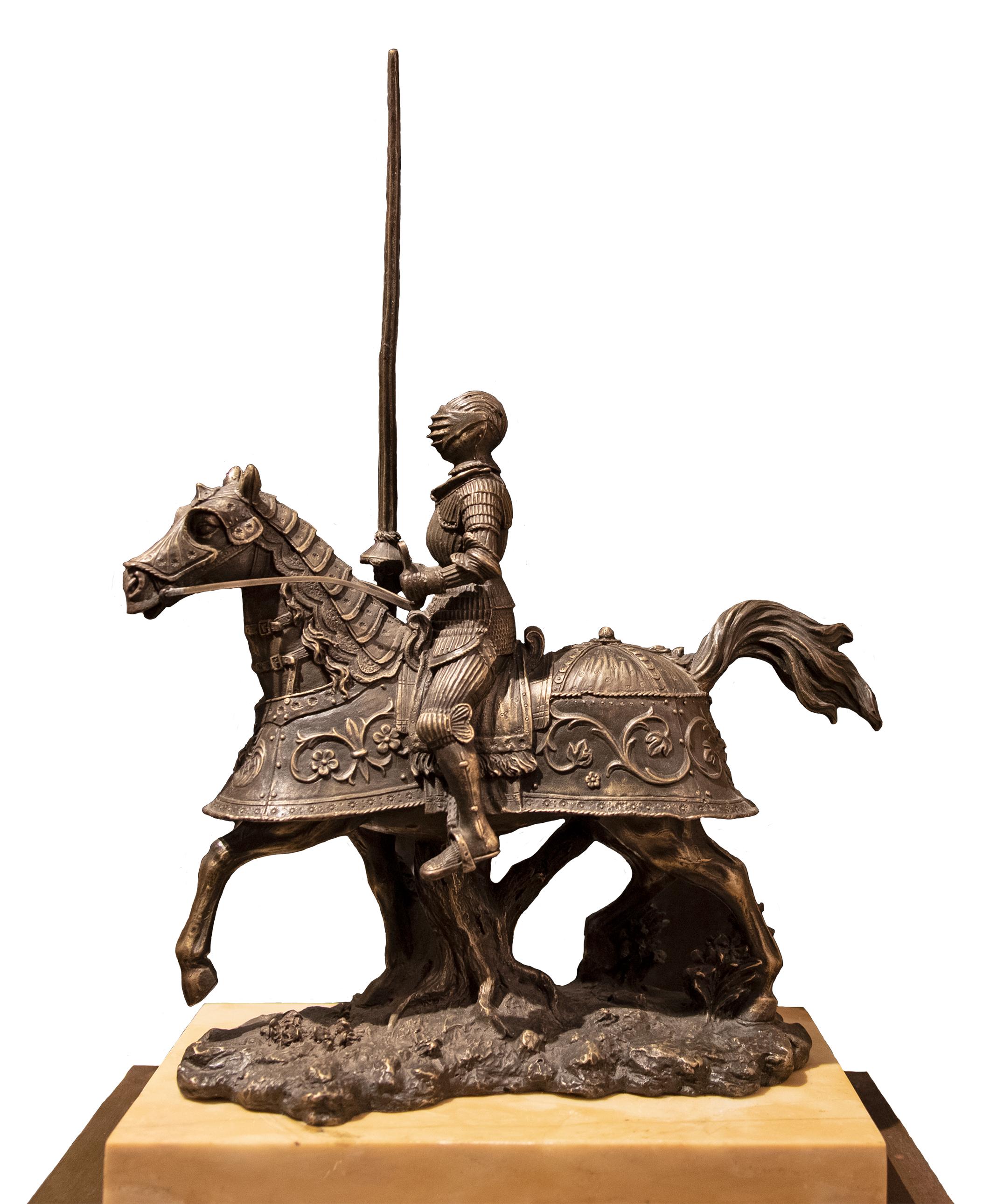 A French marble clock topped with a jouster.

Circa 1850.