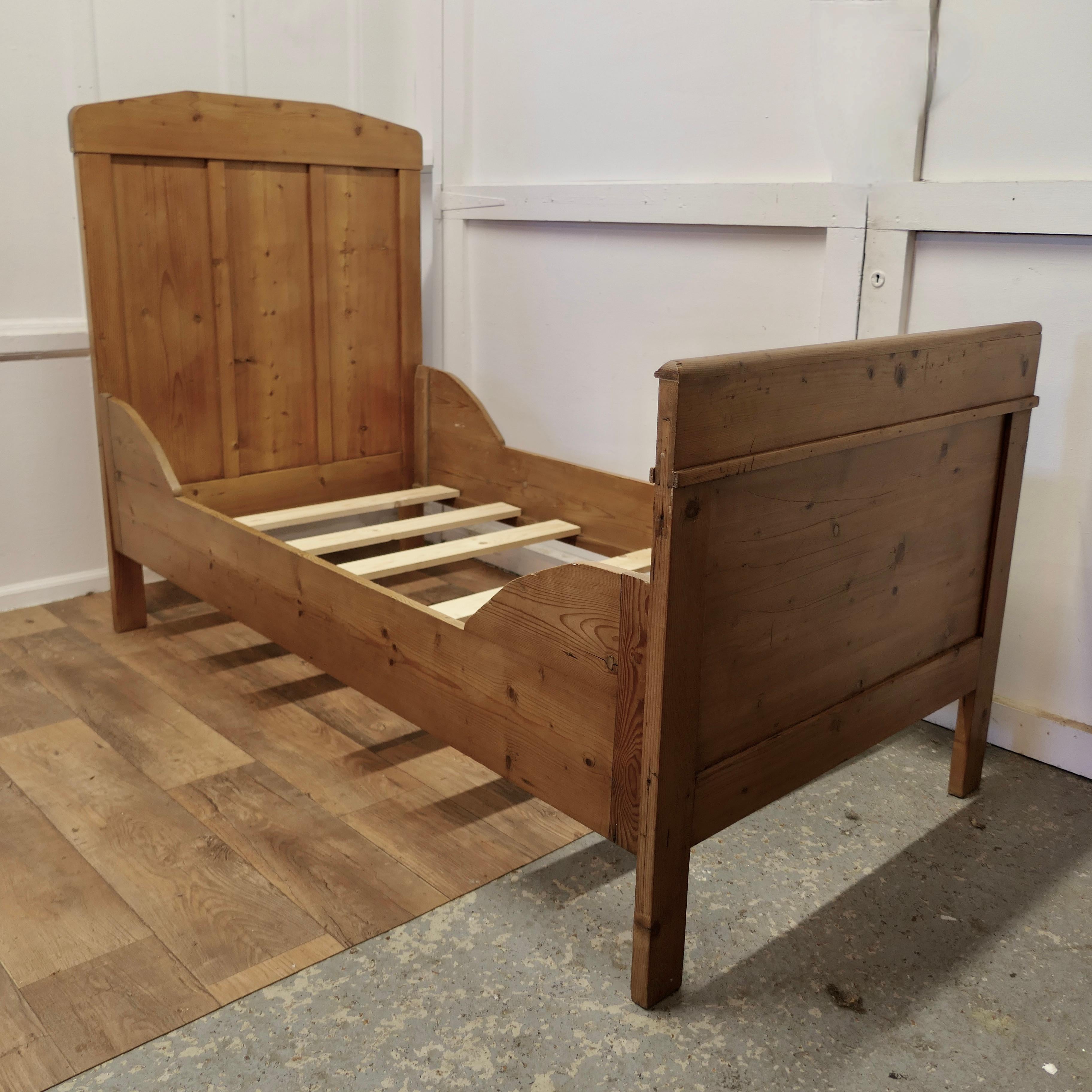 A 19th Century French Rustic Pine Single Sleigh Bed

This is a good solid piece of Pine Furniture, it is made from 1” thick pine it has 3 moulded panels at the head and a single broad panel at the foot
The sides are very attractively shaped and it