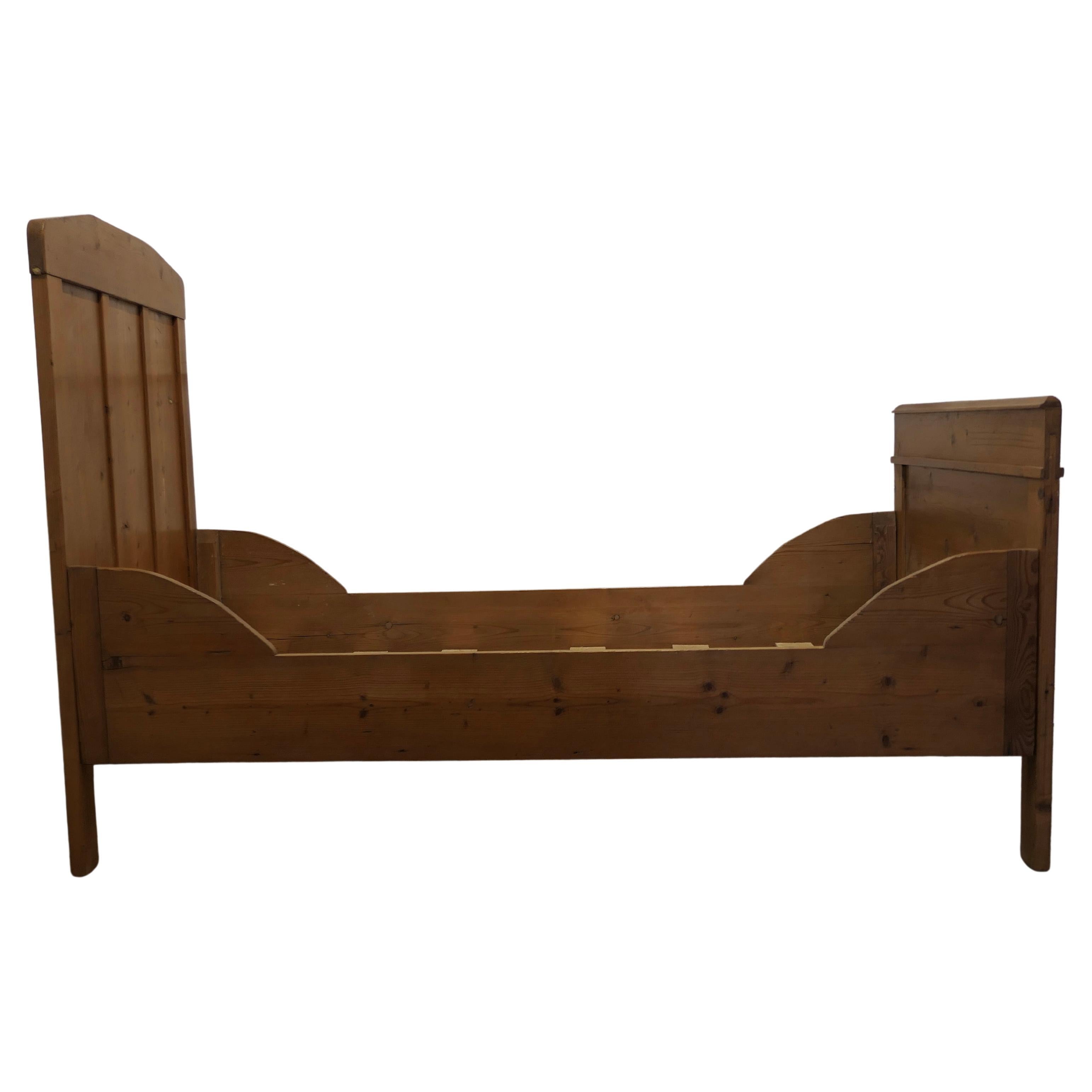 A 19th Century French Rustic Pine Single Sleigh Bed   