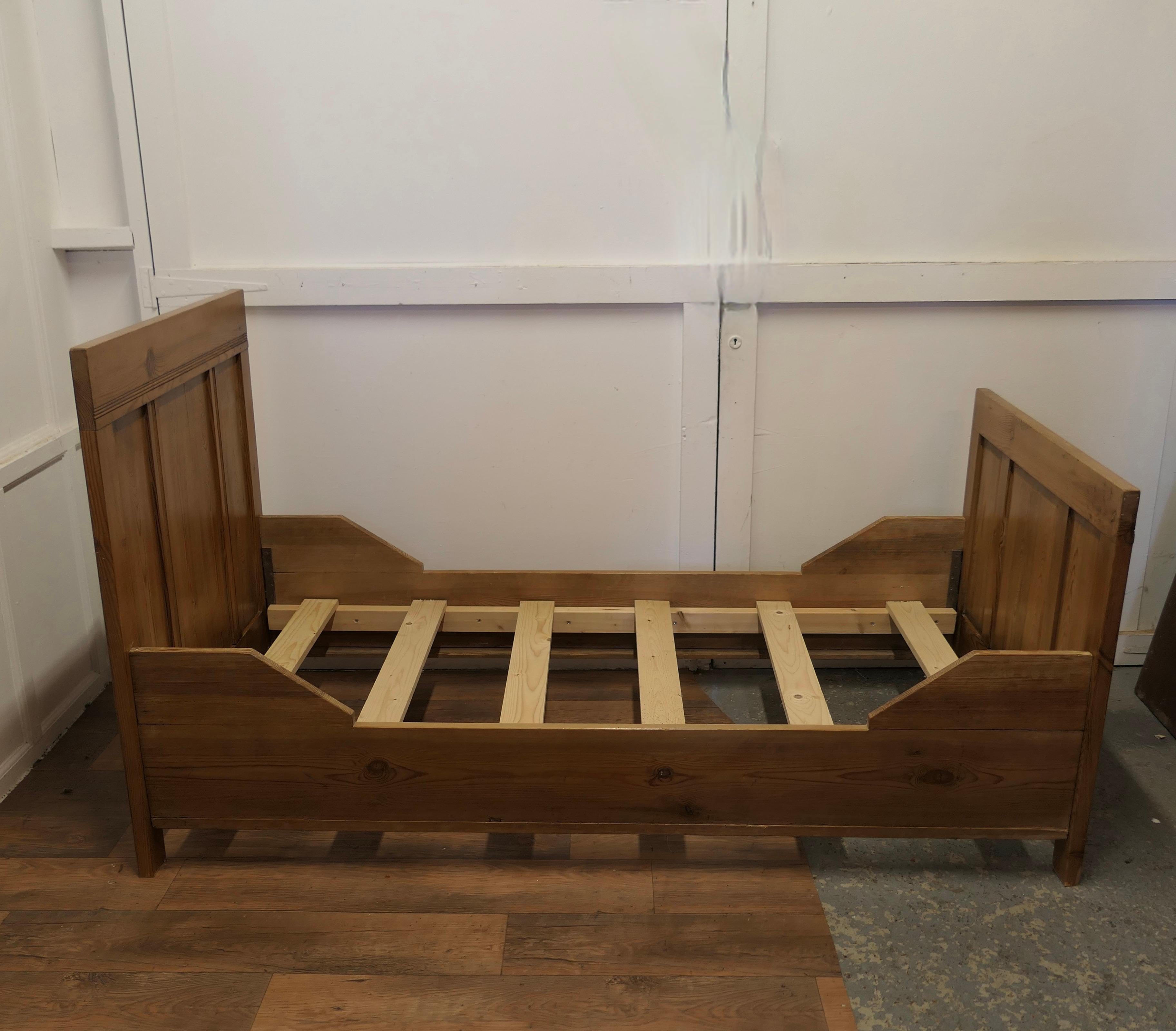 A 19th Century French Rustic Pine Single Sleigh Bed  This is a good solid piece  4
