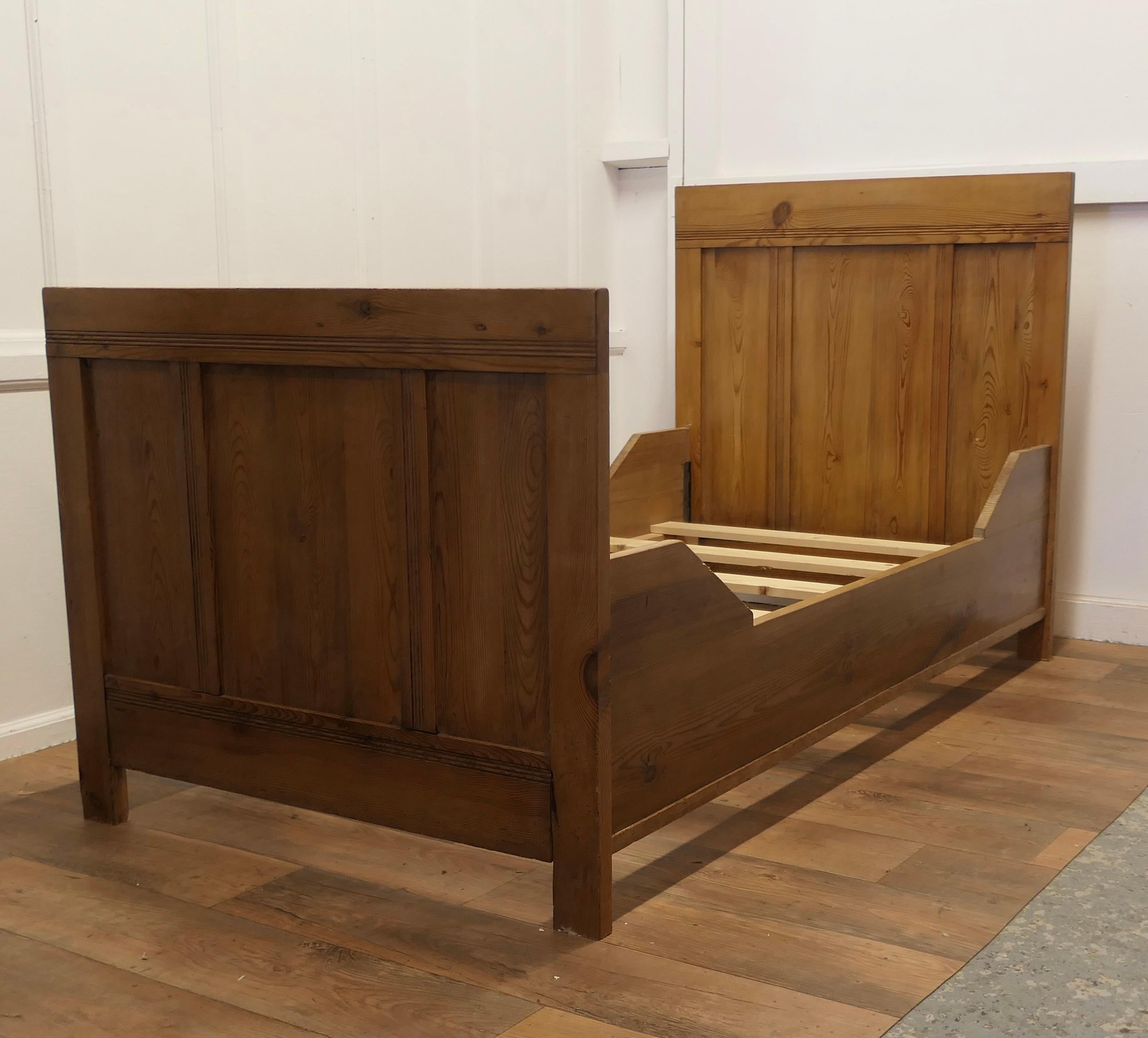 A 19th Century French Rustic Pine Single Sleigh Bed

This is a good solid piece of Pine Furniture, it is made from 1” thick pine it has 3 moulded panels at each end and is bordered with tram line decoration 
The sides are very attractively shaped