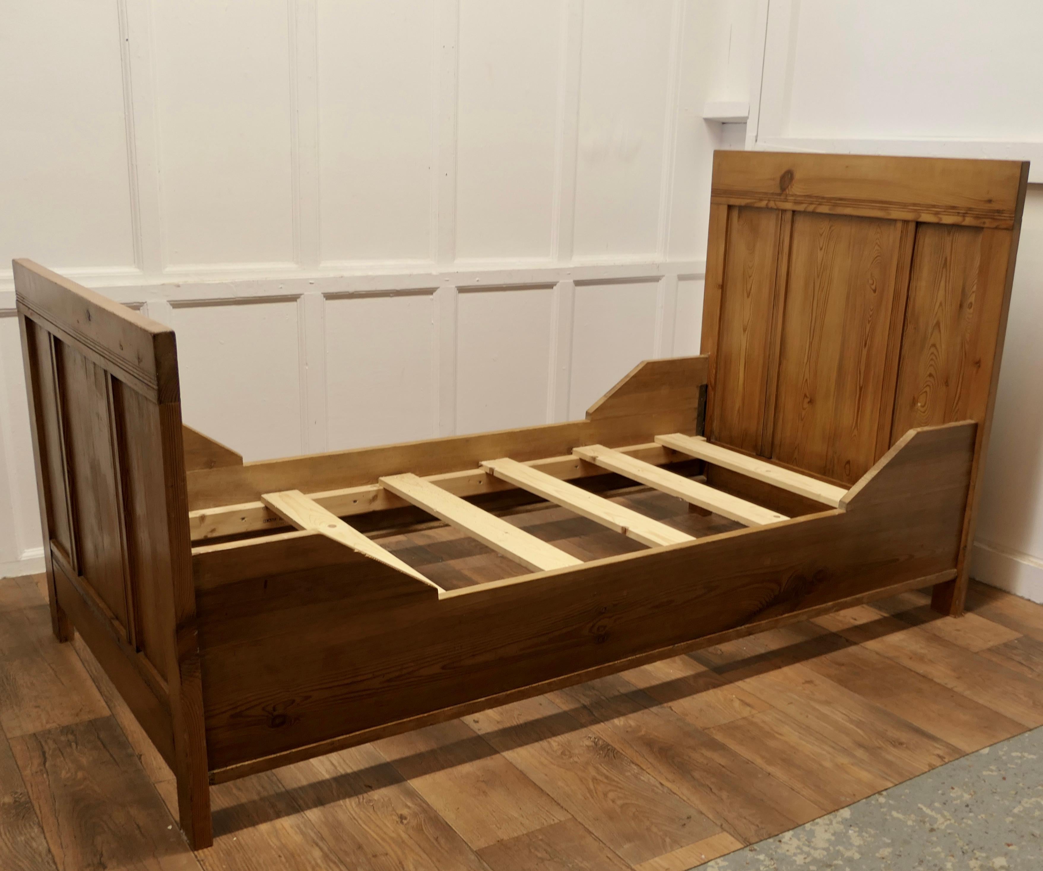 A 19th Century French Rustic Pine Single Sleigh Bed  This is a good solid piece  2