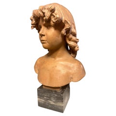 A 19th Century French Terracotta Bust Of A Young Boy