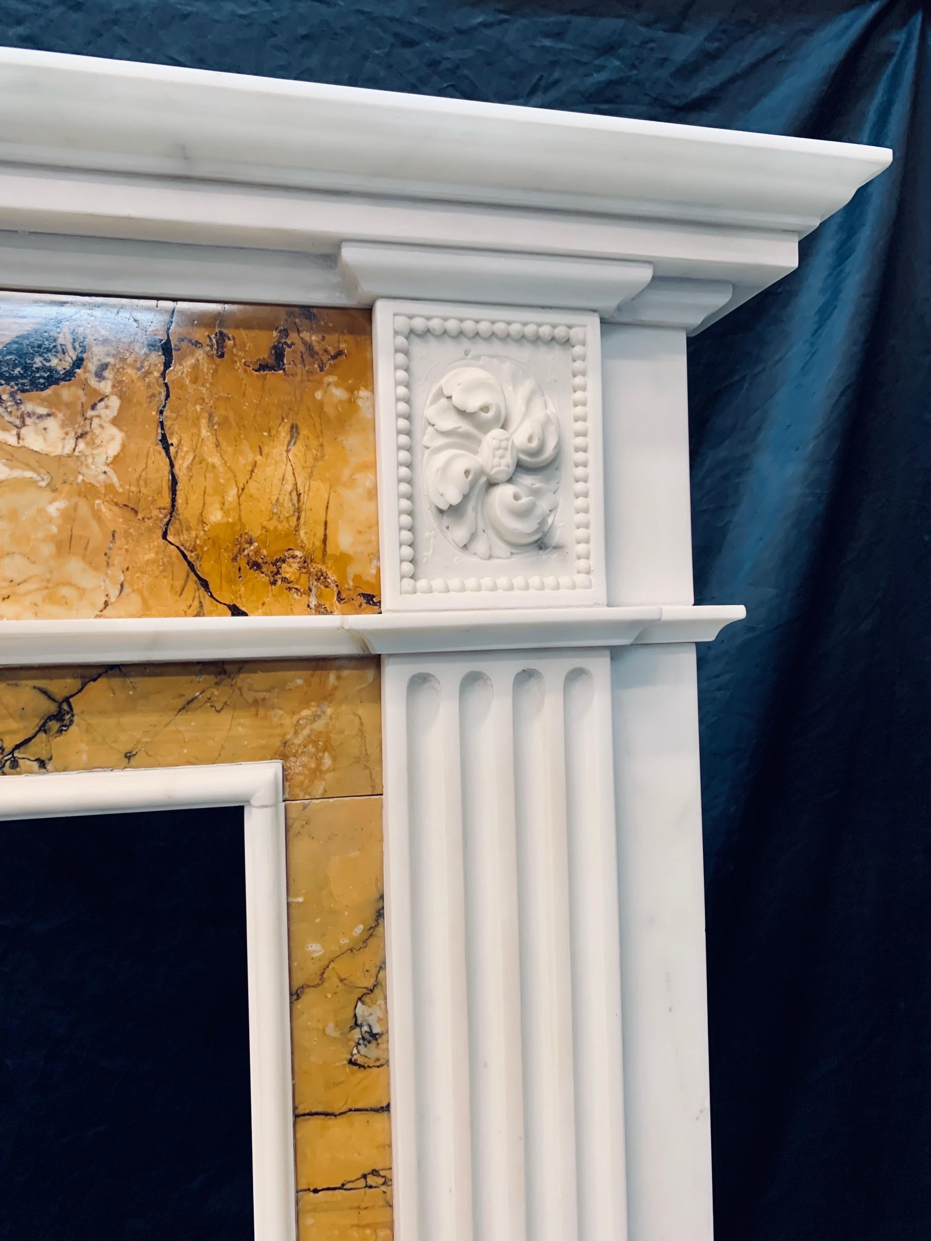 Carved A 19th Century Georgian Manner  Statuary & Sienna Marble Fireplace Surround.  For Sale