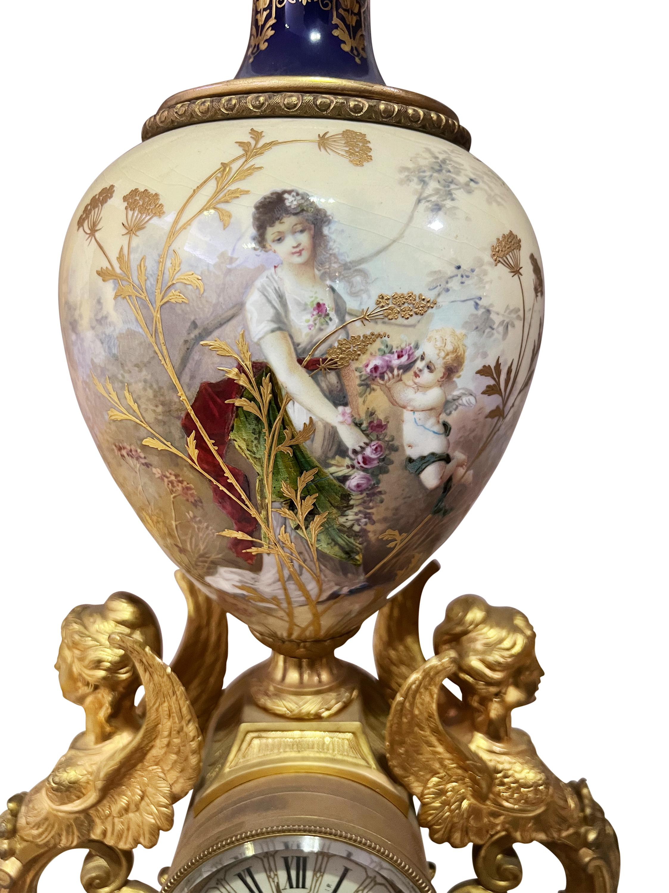 A 19th Century French Ormolu Bronze & Porcelain Figural Mantel Clock Retailed by Tiffany & Co.

Having an ormolu case with two winged maidens centered by the porcelain dial with Roman Numerals. 
The bottom of the dial marked Tiffany & Co. New York.