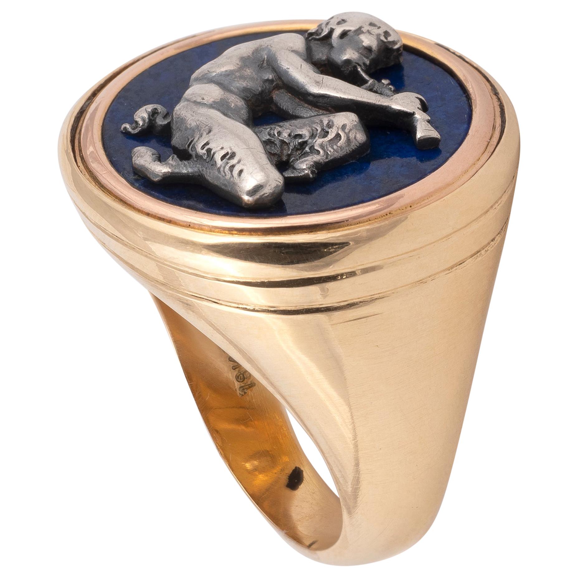 Depicting Pan playing the pipes in silver on lapis lazuli, within gold border, 2.1cm wide
Size : 7
The Maison was founded in 1839 by François-Auguste Fannière and François-Joseph-Louis Fannière. they were draftsmen, sculptors, scissors and