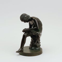 sculpture en bronze du Grand Tour du 19ème siècle représentant un Spinario ou un garçon avec une épine