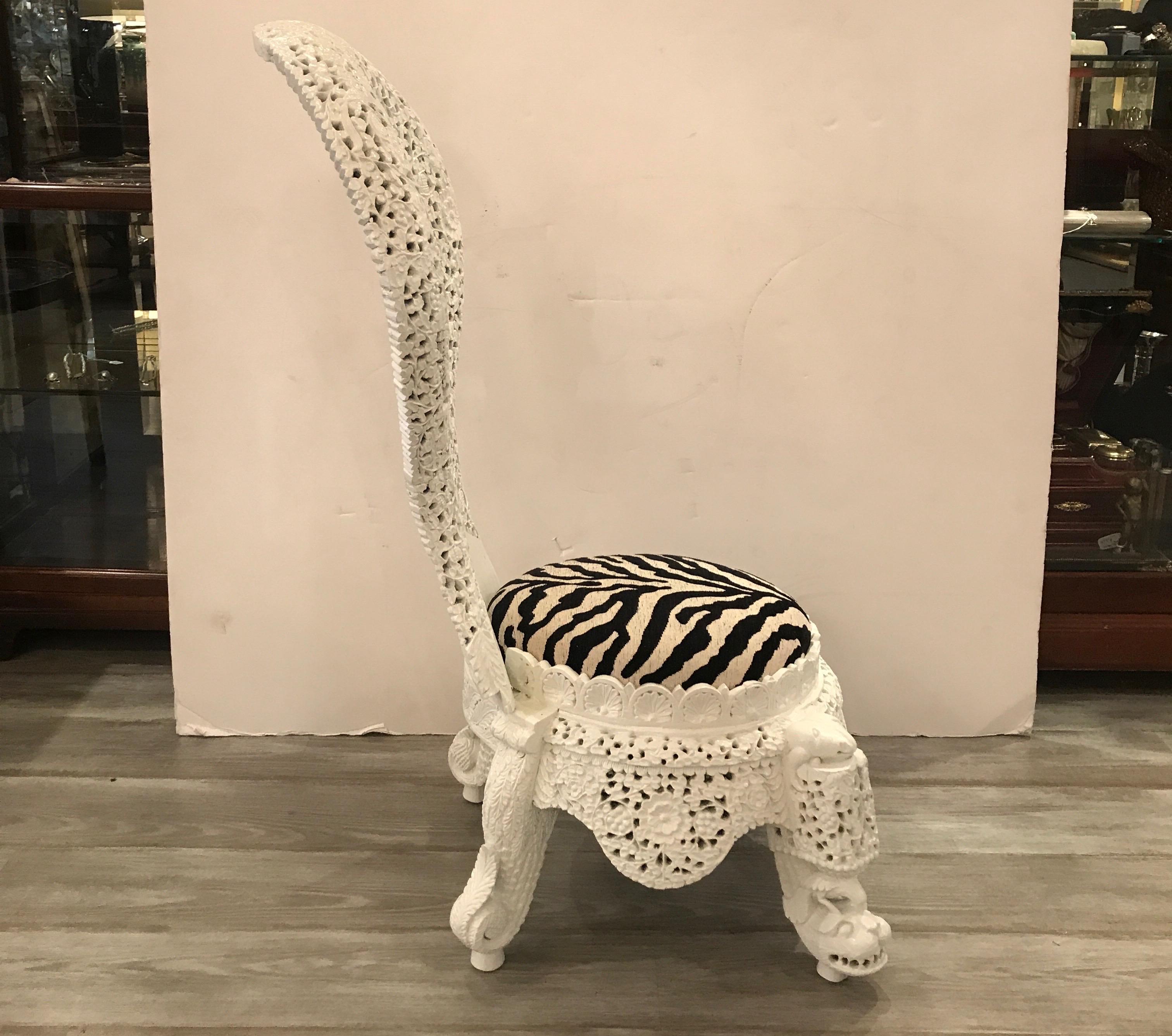 A white finished hand carved hardwood Anglo-Indian slipper chair with balloon back. The rounded seat with shapely apron with figural carved feet of dragons. The white finish is freshly done which a stylish zebra pattern fabric upholstery, 19th
