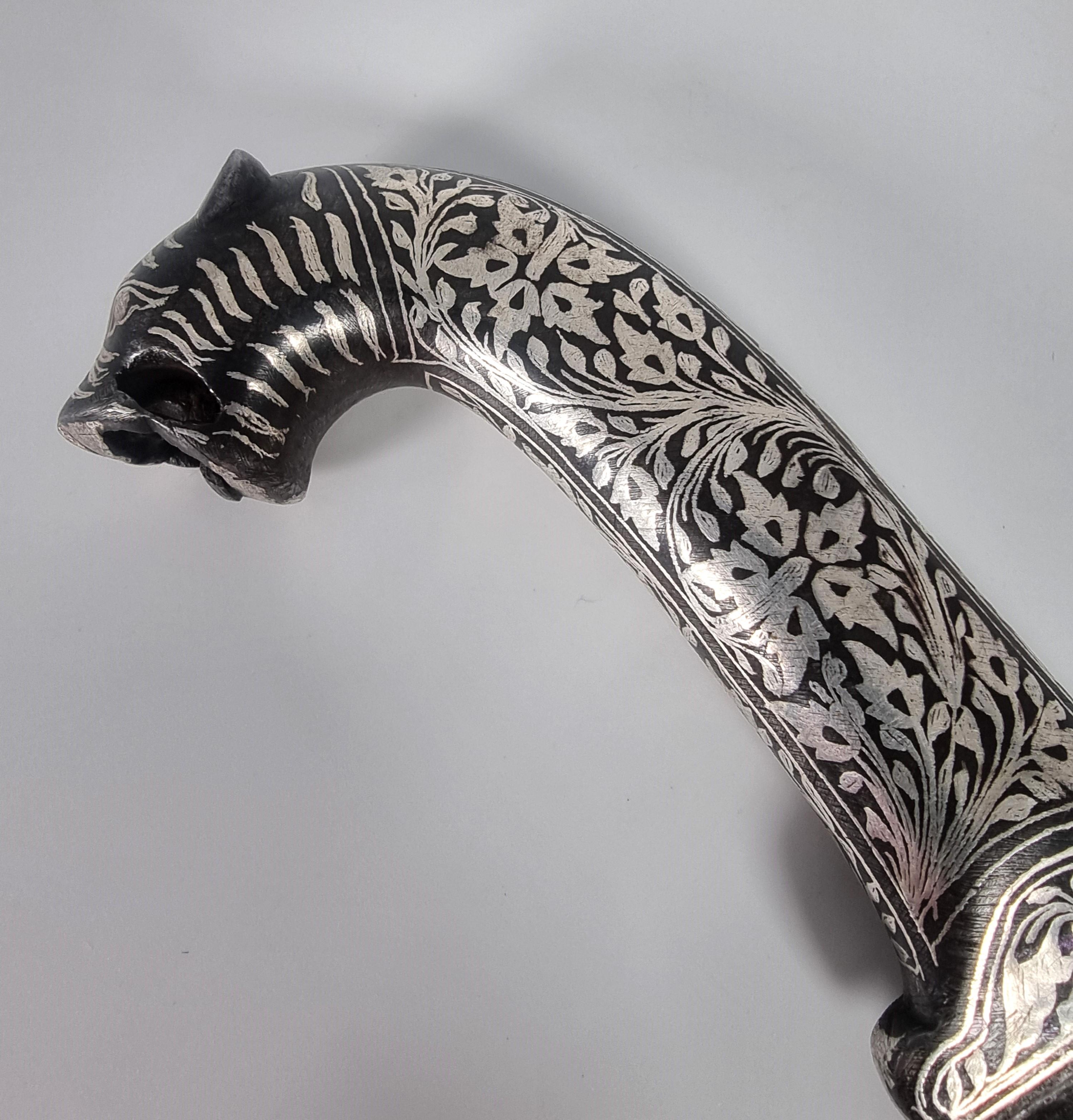 Silver A 19th century Indian silver inlaid dagger with a Damascus steel blade, C 1870