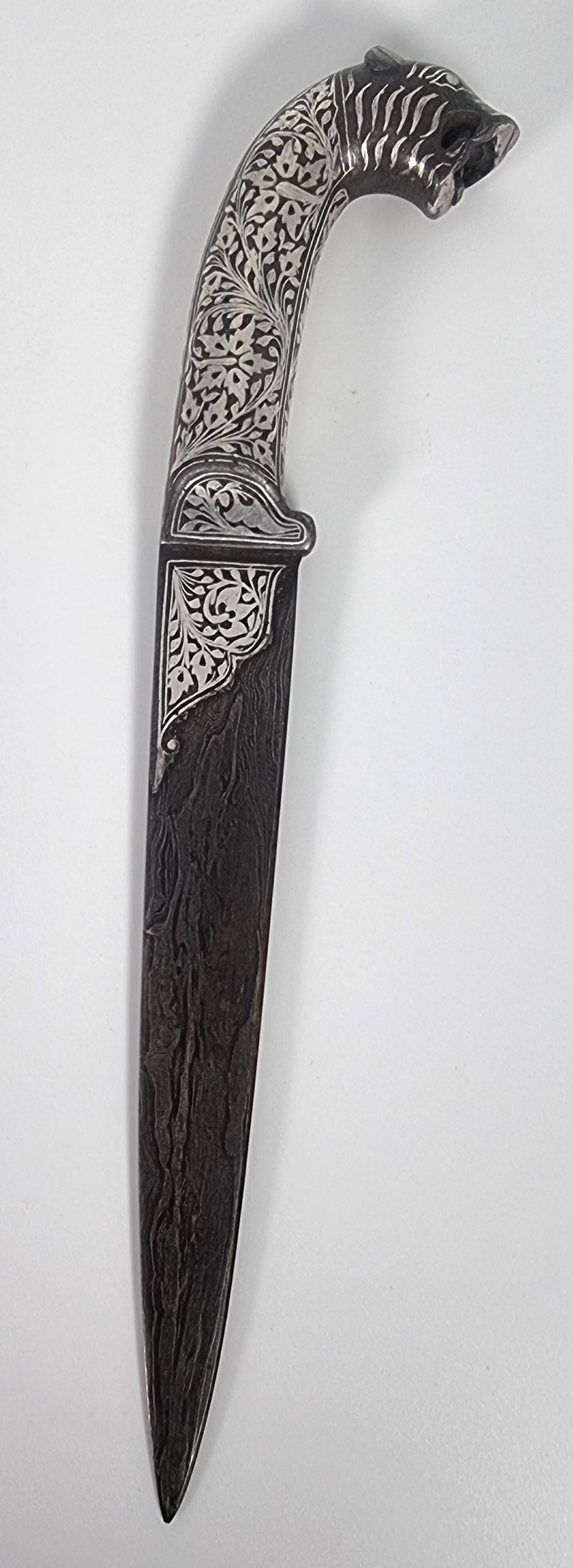 A 19th century Indian silver inlaid dagger with a Damascus steel blade, C 1870 For Sale 1