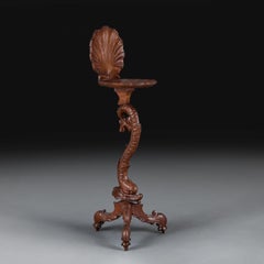 A 19th Century Italian Carved Dolphin Torchere Pedestal
