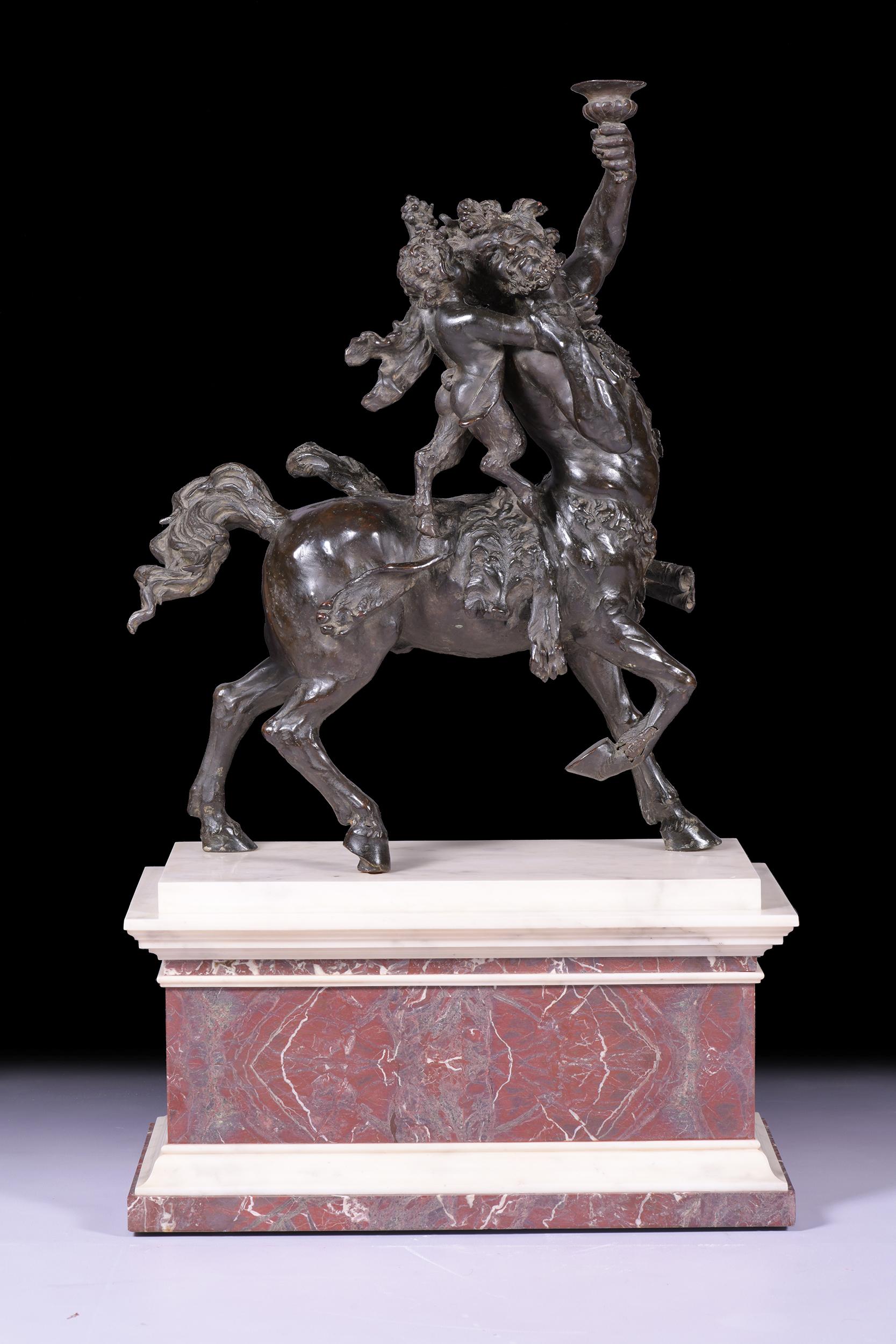 A stunning large and opposing 19th century bronze of Centaur with Eros on its back on marble base. This magnificent bronze is set on a large piece of marble.

Circa 1830

French

Footnote:

Tradition has it that a centaur be a monstrous