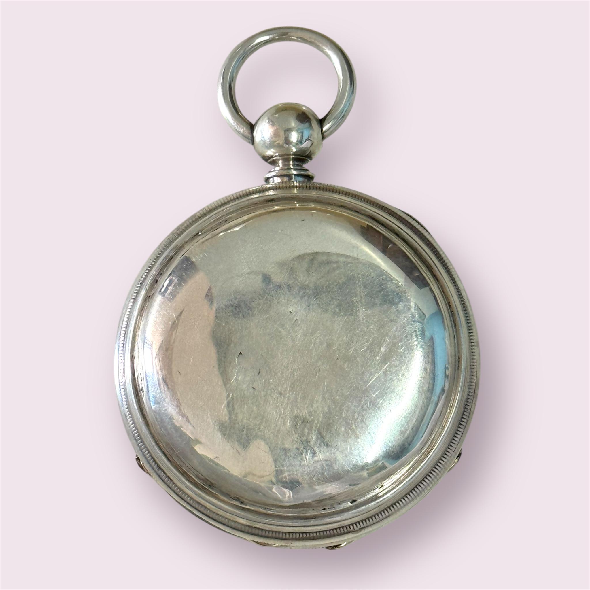 This 19th Century large silver pocket watch by S.N. Thompson, Boston, around 1871, features a mechanical (manual) movement with an open face closure. The white dial has a solid silver case with a verge escapement type. With a diameter of 50mm, this