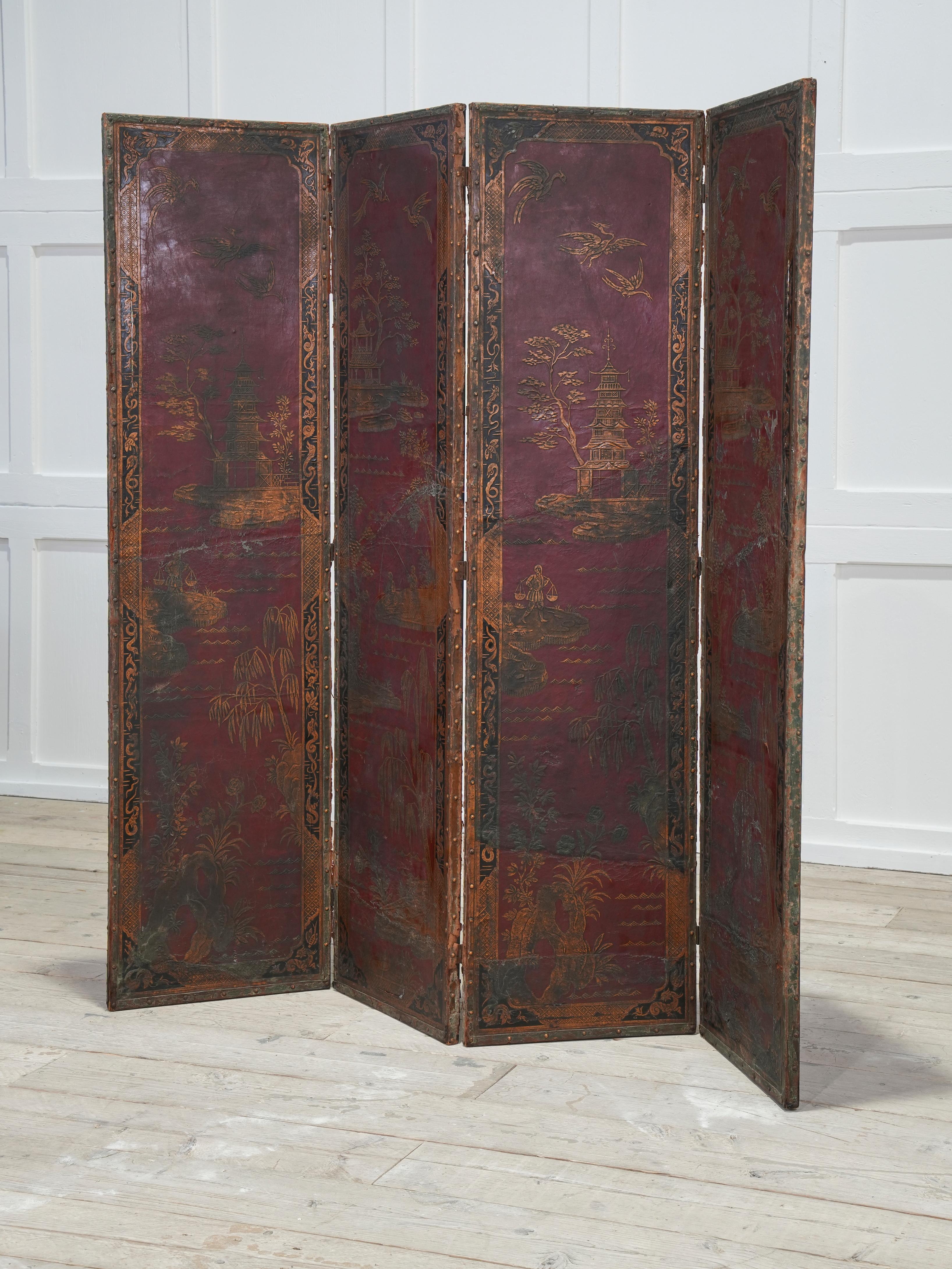 A fourfold impressed leather painted and gilt room screen
English, second half of the 19th century.
H: 183 W: 180 (each panel 45 cm) W: 2.5 CM.
H: 72 W: 70.8 (each panel 17.7 inches) W: 1 INCHES.