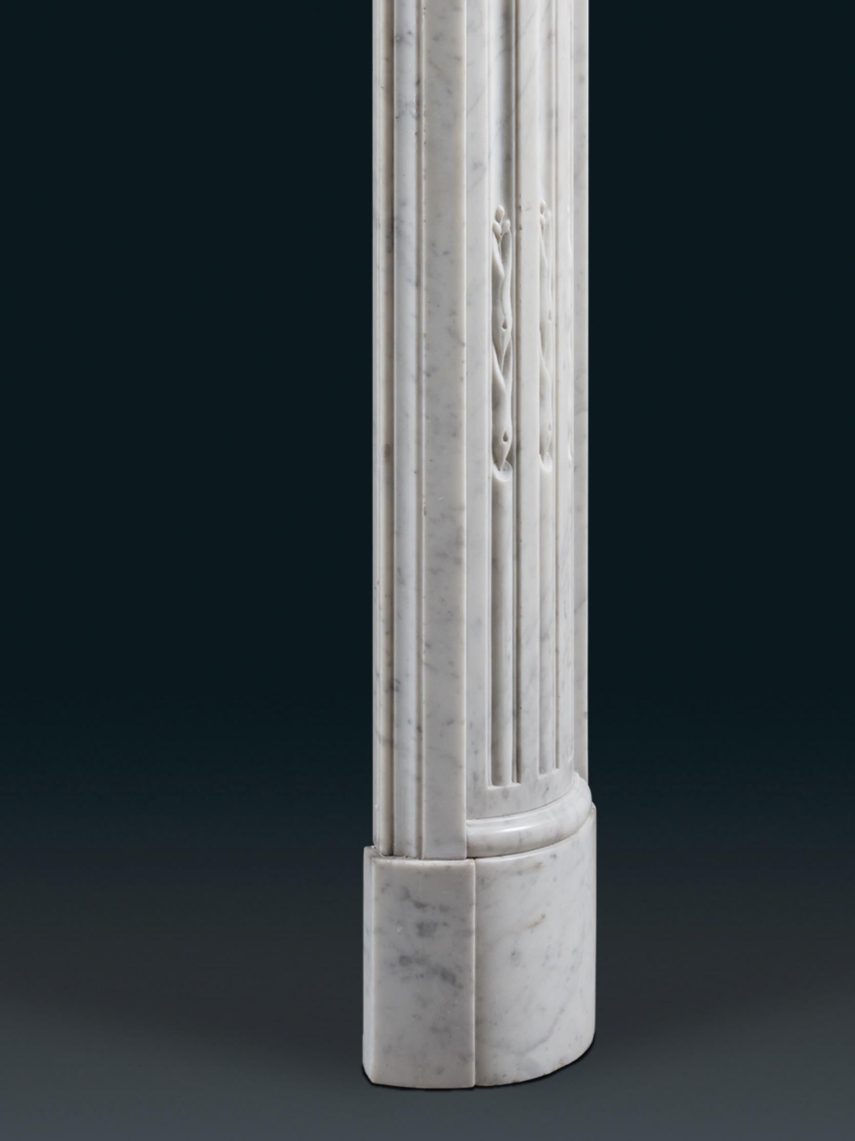 A 19th Century Louis XVI Style Chimneypiece in Carrara Marble For Sale 1