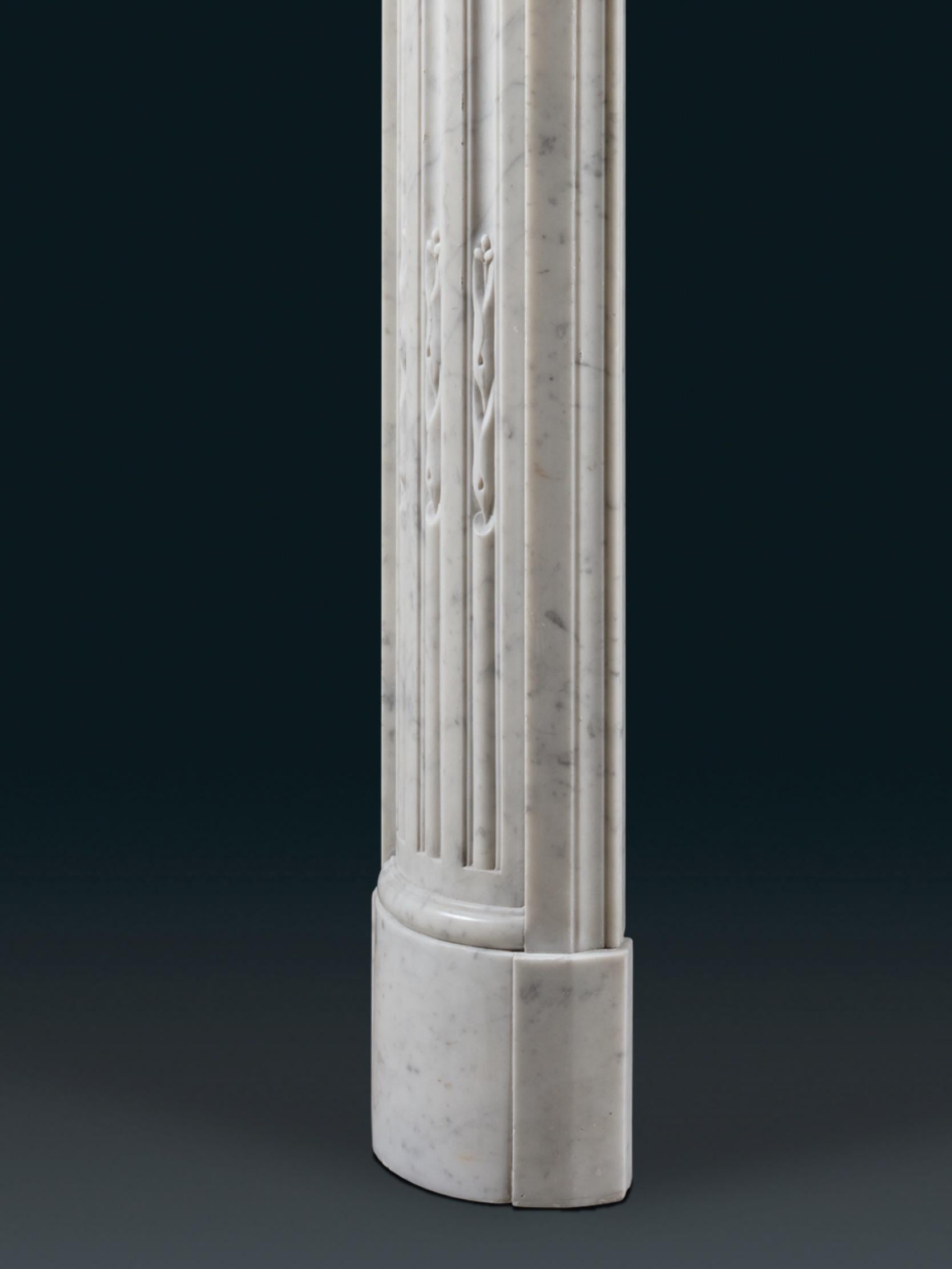 A 19th Century Louis XVI Style Chimneypiece in Carrara Marble For Sale 2