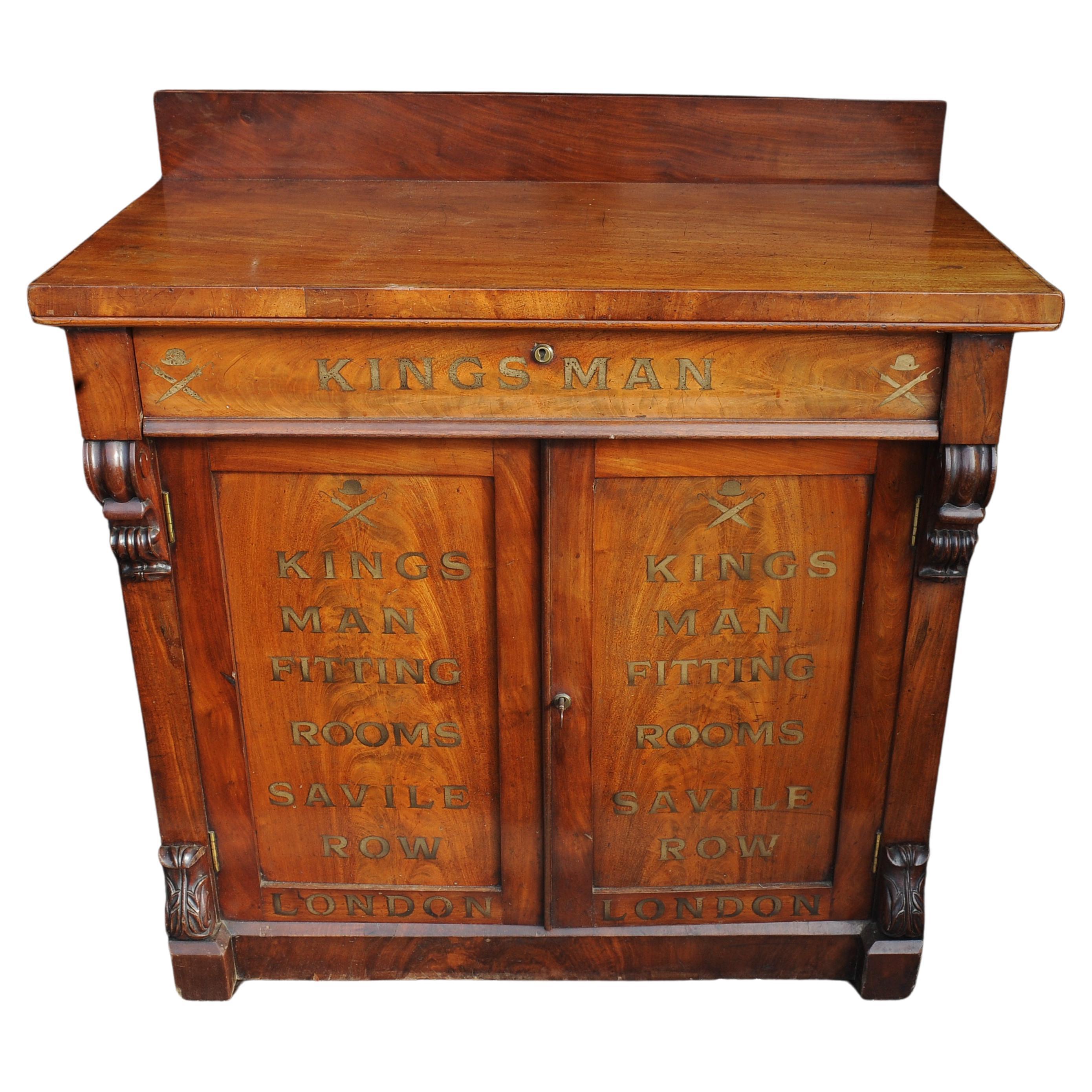 Kingsman Film Prop 19th Century Mahogany Carved & Hand Gilt Painted Chiffonier 


A 19th Century Mahogany Carved & Hand Gilt Painted Chiffonier with Kingsman Branding Prop From the Film Franchise

With Decorative Carved Pedestals, Fitted Brass Key &