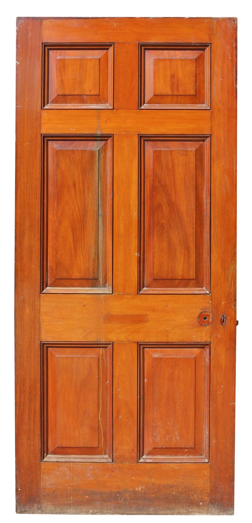 A substantially constructed Georgian style solid Mahogany door. This door is of six panel configuration with raised and fielded panels.