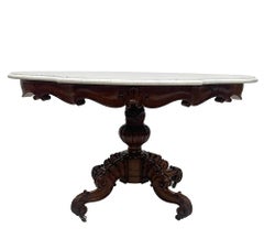 A 19th Century mahogany table with a cartouche-shaped marble top, ca 1840