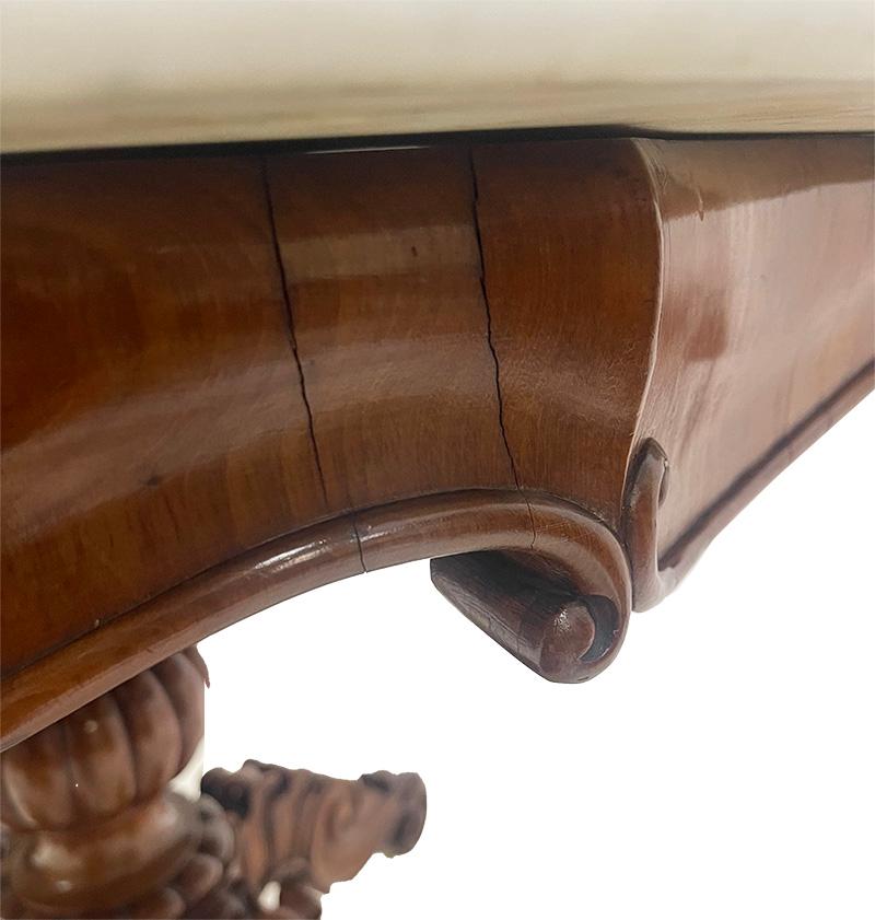 Dutch A 19th Century mahogany table with a cartouche-shaped marble top, ca 1840 For Sale
