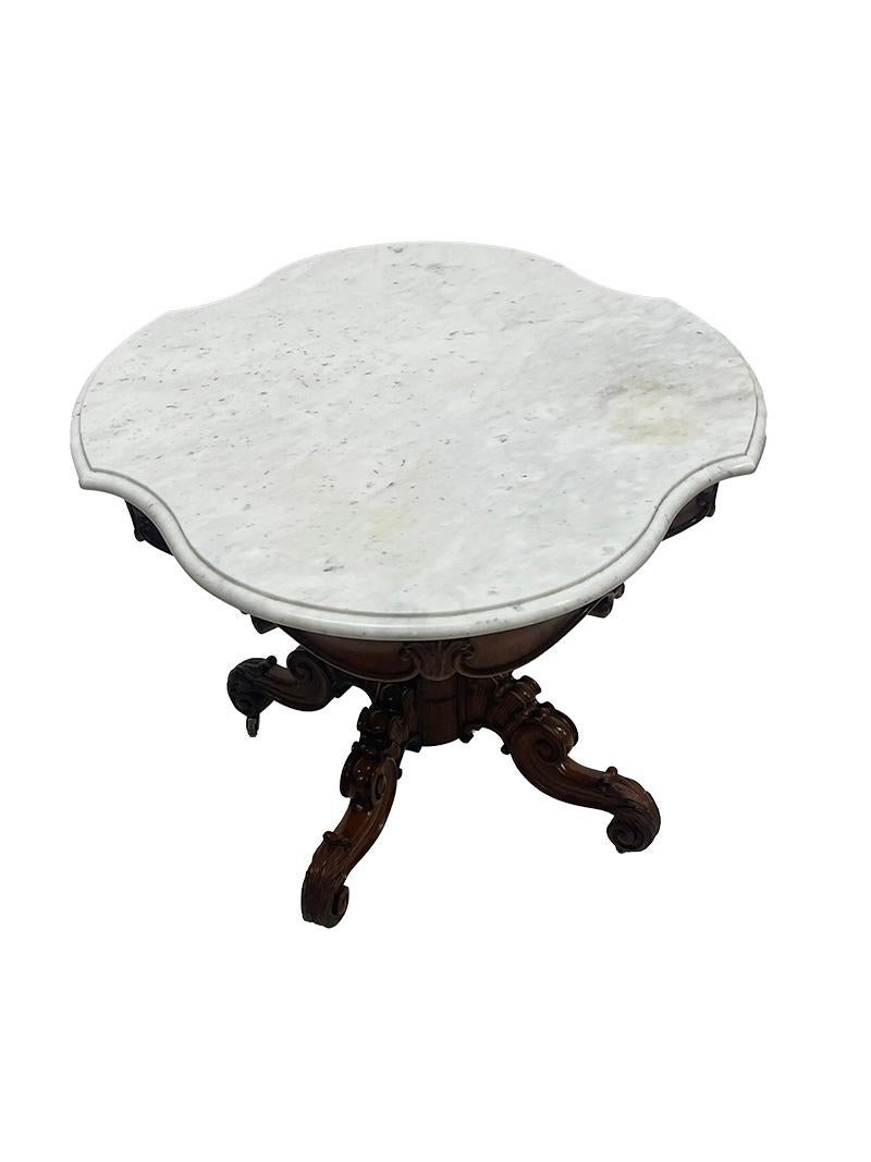 A 19th Century mahogany table with a cartouche-shaped marble top, ca 1840 For Sale 2