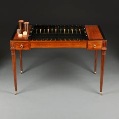 A 19th Century Mahogany Tric Trac Table On Reeded Tapering Legs