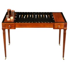 A 19th Century Mahogany Tric Trac Table On Reeded Tapering Legs