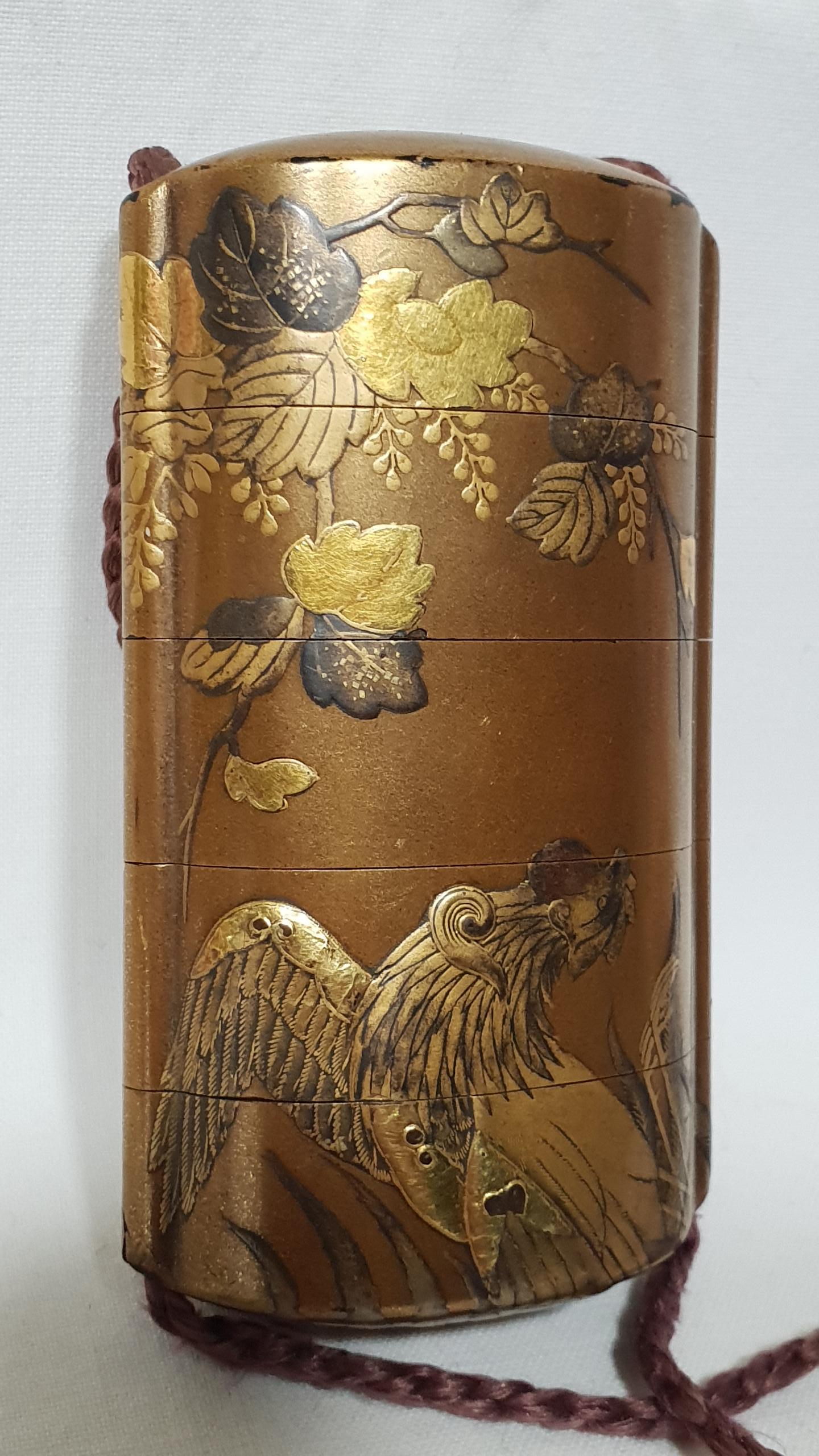 A four cases gilt Lacquered inro decorated with a paradise bird and flowers.
With a rose agate ojime.
   
