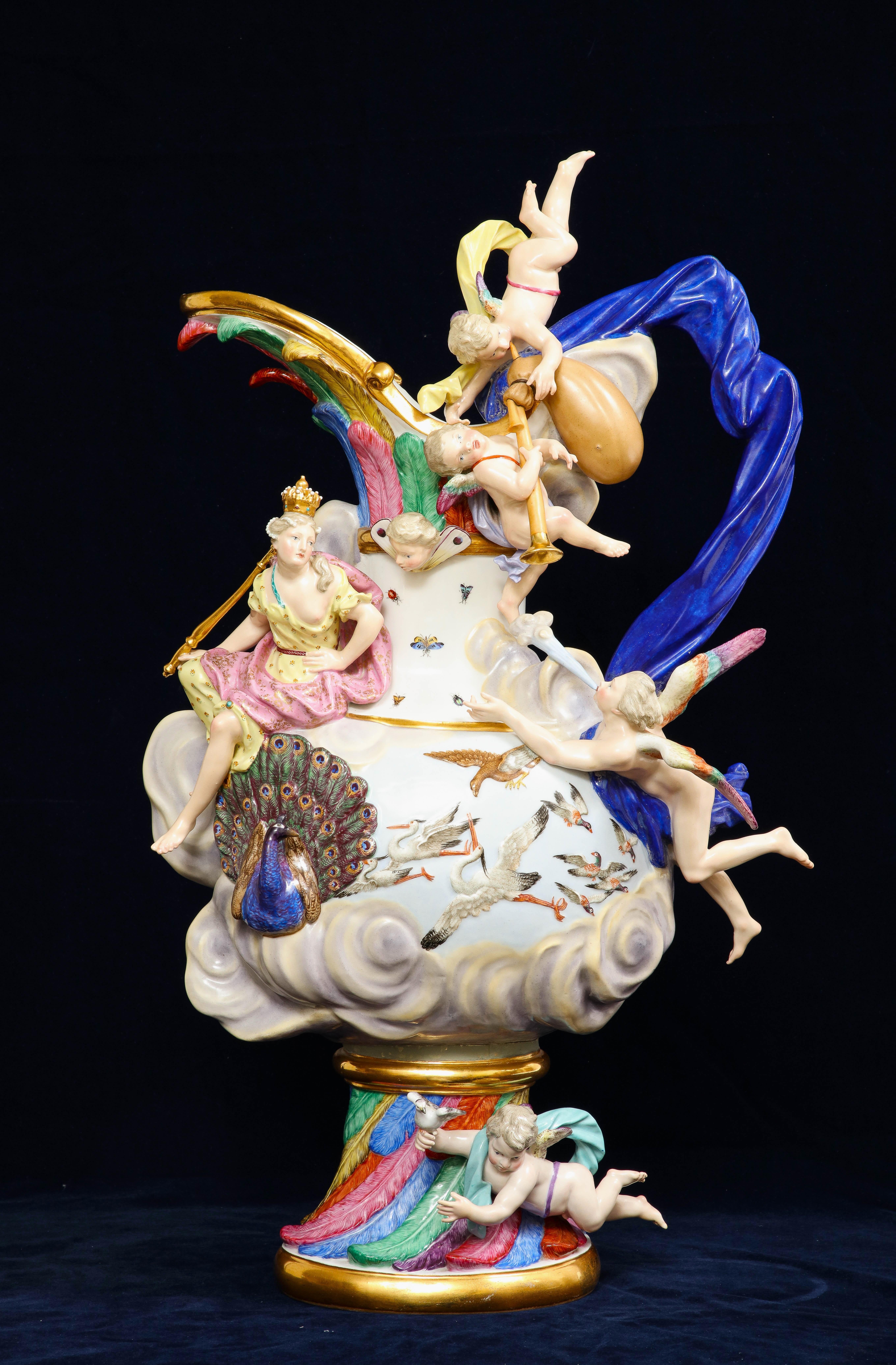 A 19th century Meissen porcelain 'Elements' ewer emblematic of air. Blue crossed swords mark. The present ewer, representing water, is after the set modelled by Johann Joachim Ka¨ndler in 1741. Of flattened baluster form with flared spout and