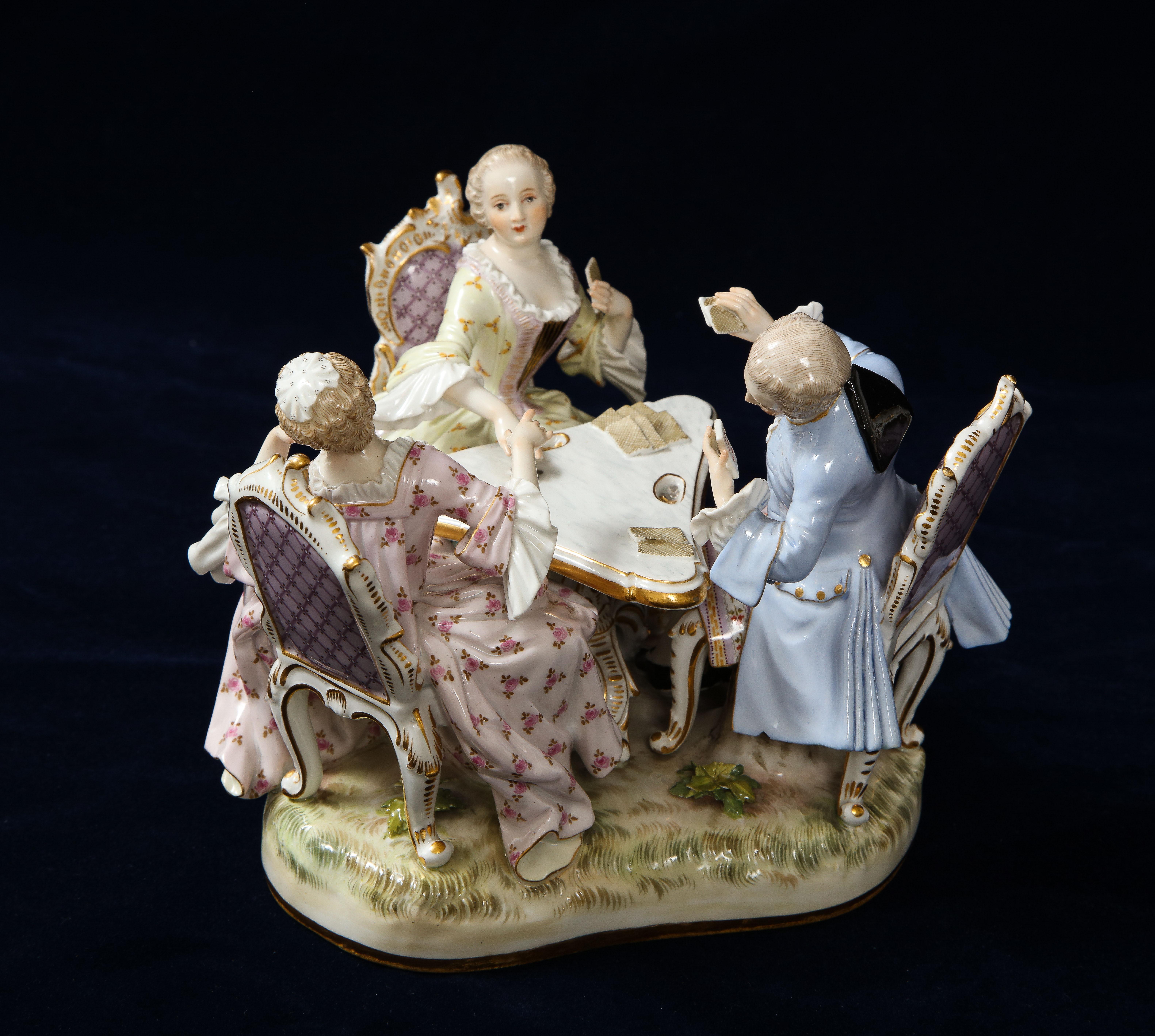 A fabulous and beautiful condition 19th century Louis XVI style Meissen porcelain group of three card players gallant figures. This grouping by Meissen is of the finest quality of hand painted work by the Meissen factory. Each figure is